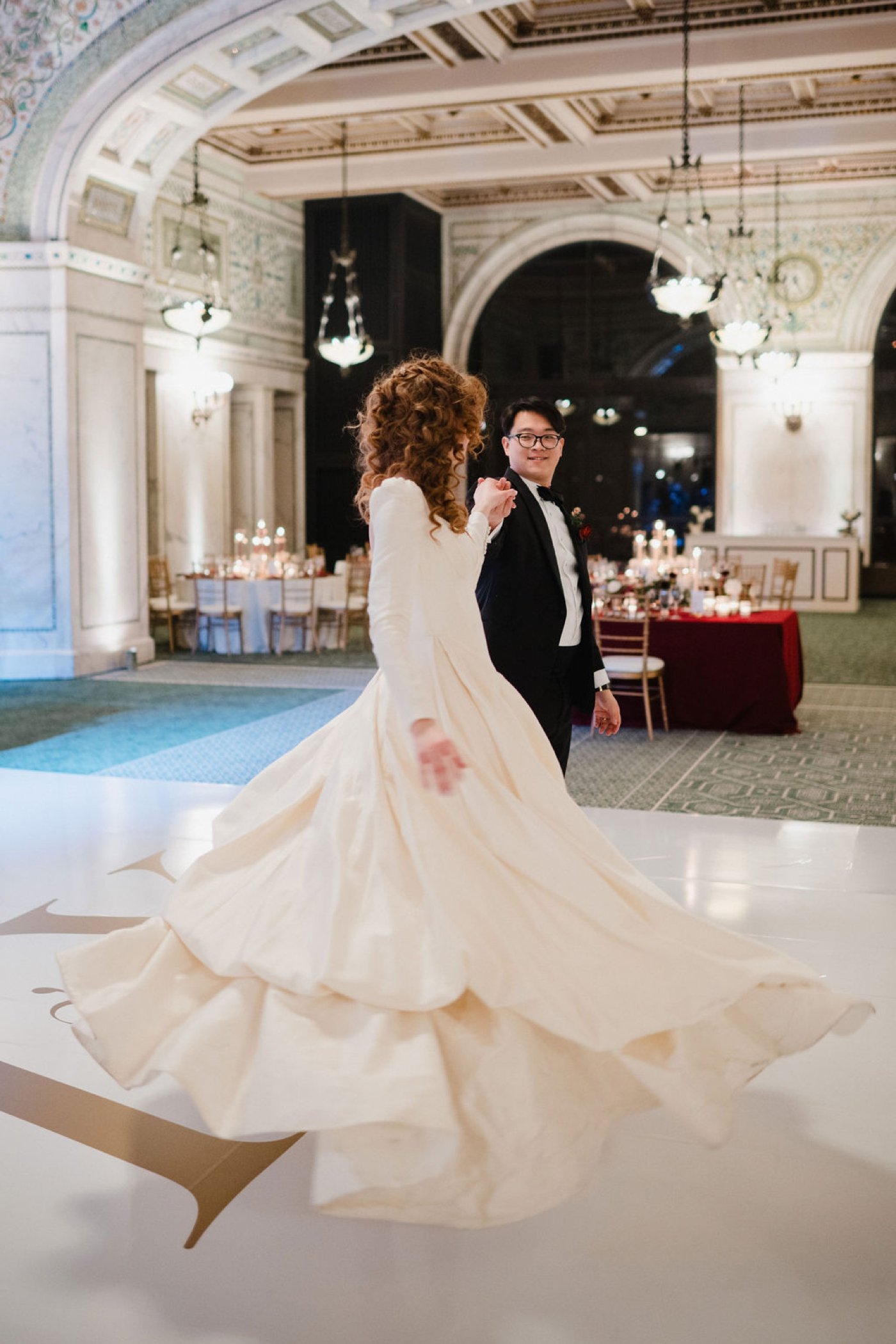 Bride and groom dancing in the Preston Bradley Hall at the Chicago Cultural Center
