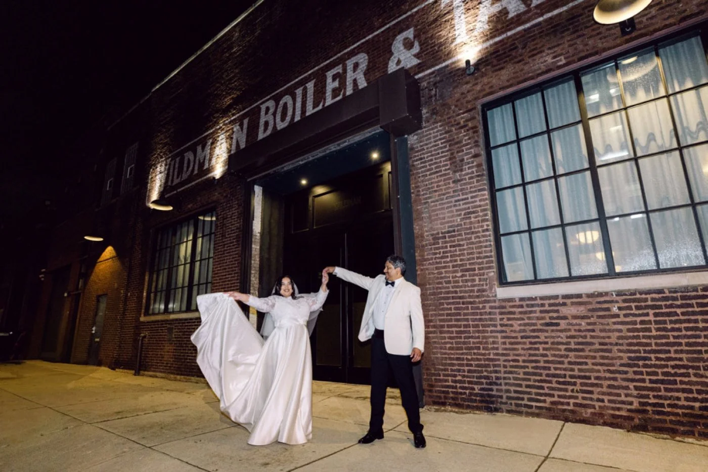 Bride and groom dancing outside of Wildman BT in Downtown Chicago