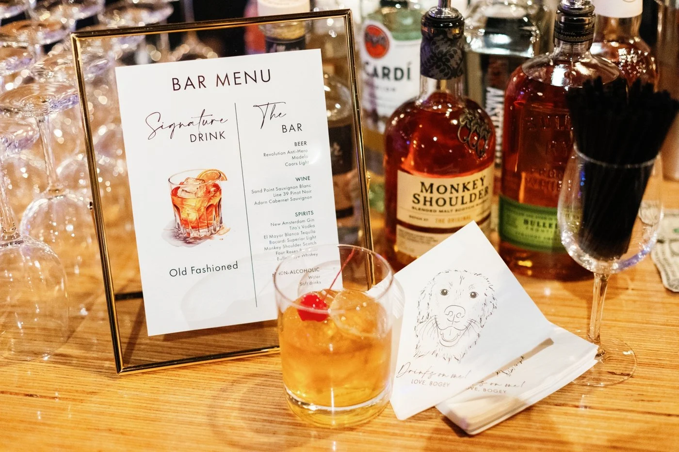 Bar menu with custom pet artwork napkins for a Chicago wedding