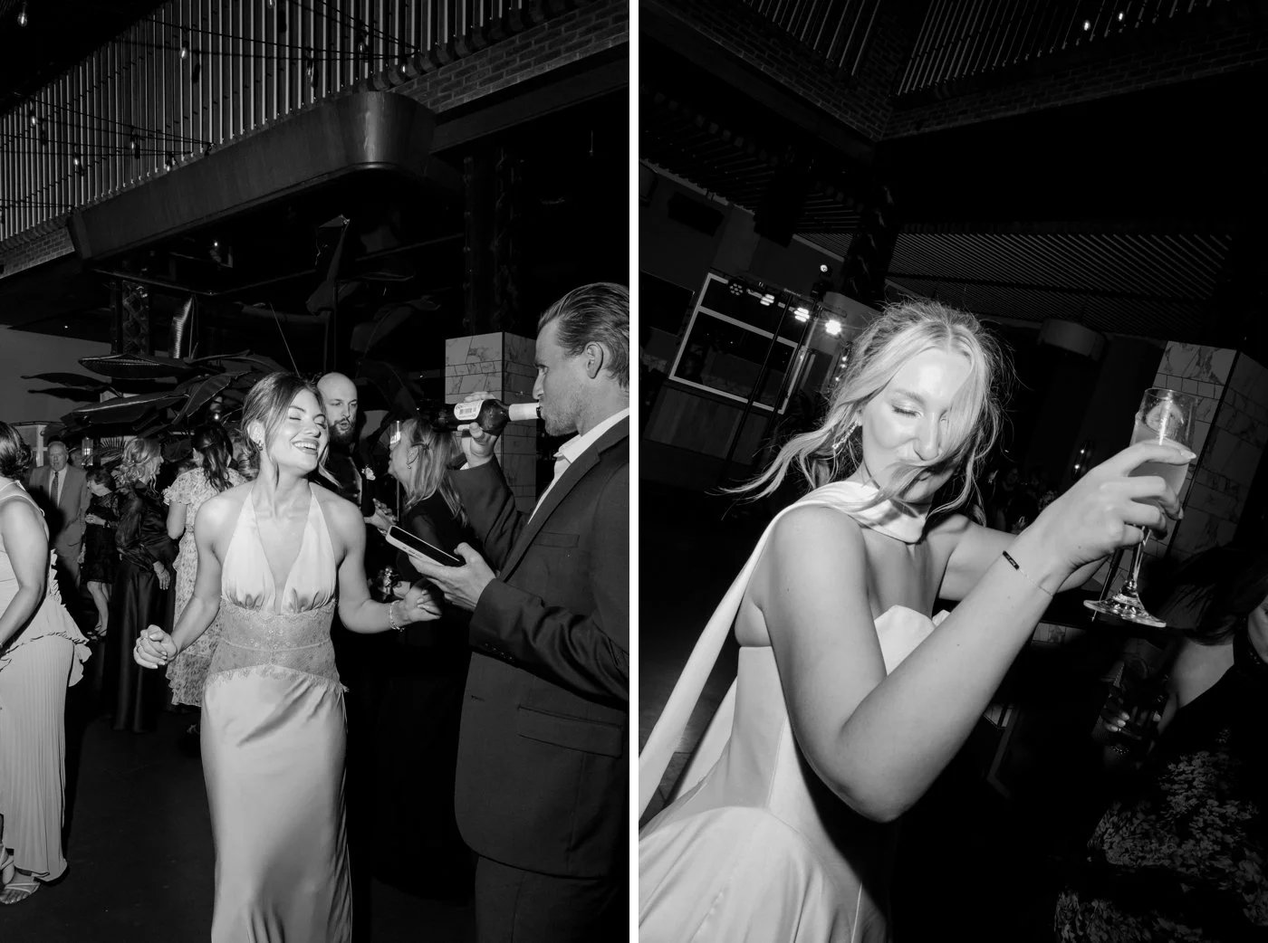 Bride holding a drink and dancing at her wedding reception