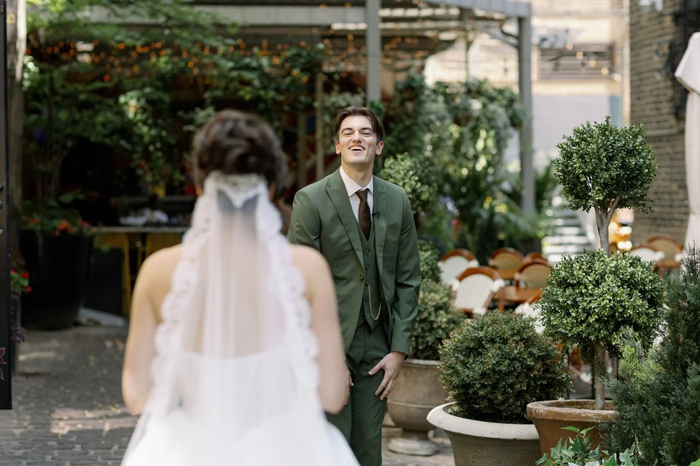 Groom seeing bride for the first time, wedding first look