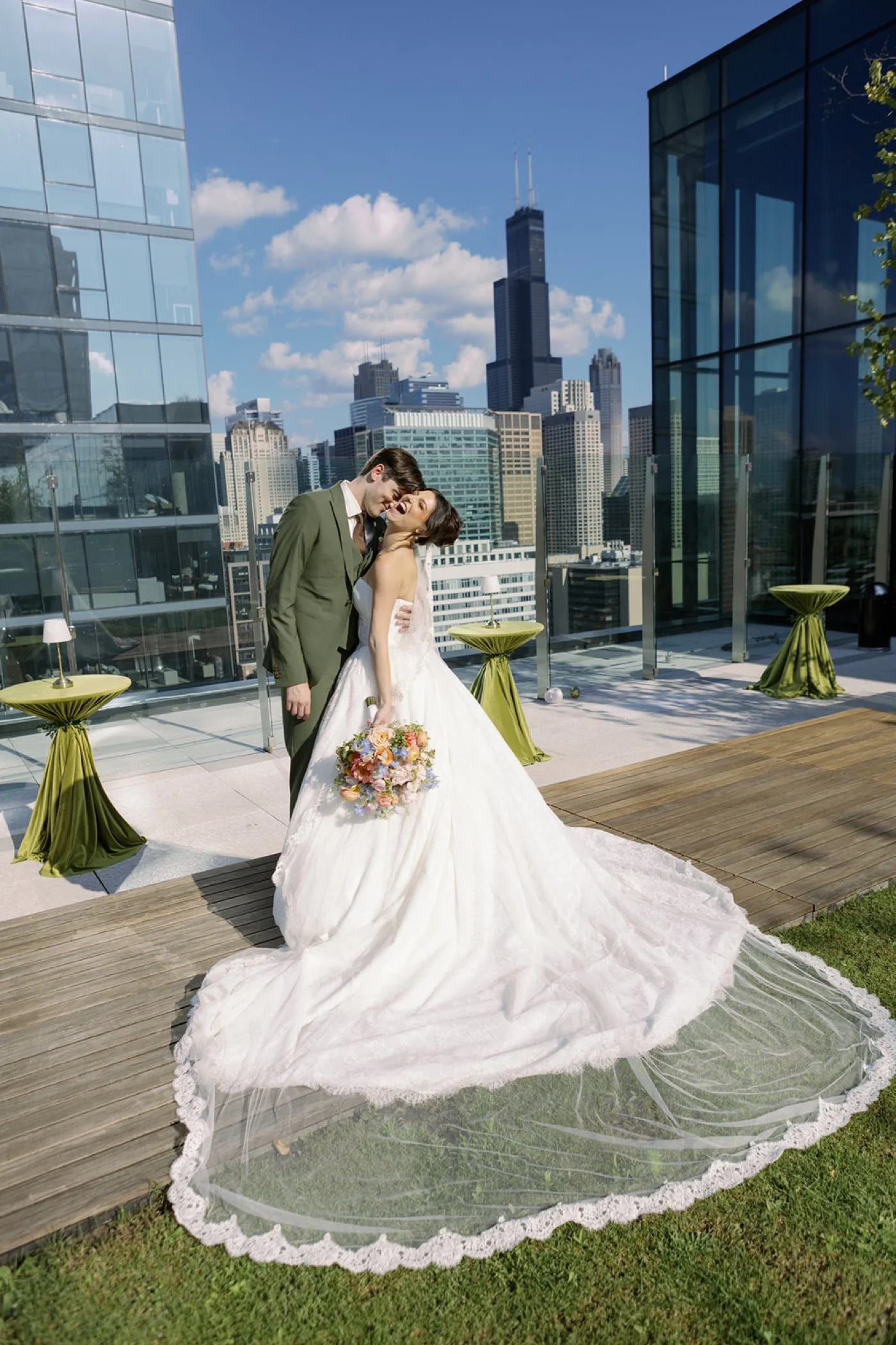 Bride and groom on the roof of 167 Green