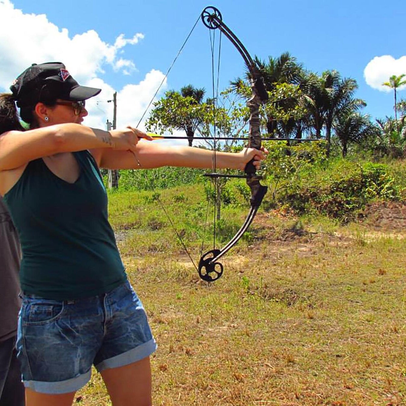 Girl Shooting Bow in EcoForest Adventure Park