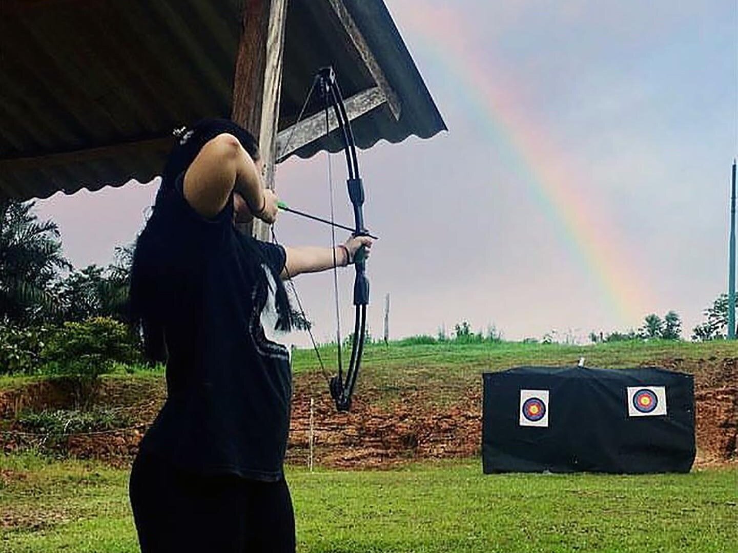 Girl archer with rainbow in background OPT.jpg
