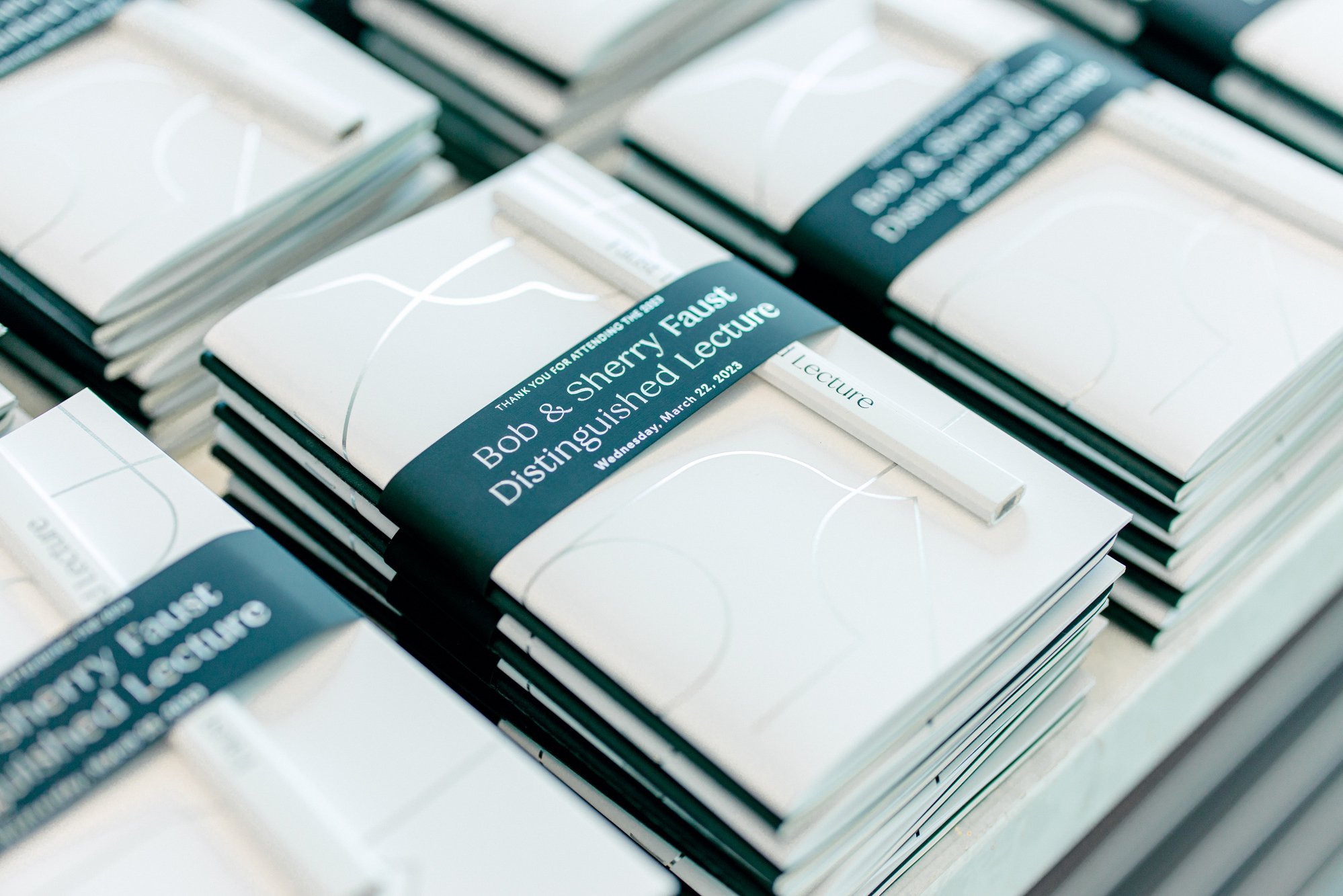   CHALLENGE  The inaugural Bob &amp; Sherry Faust Distinguished Lecture required a visual identity that honored the work of Robert L. Faust, Professor Emeritus of Architecture at Auburn University, while providing a flexible, long-term system for fut