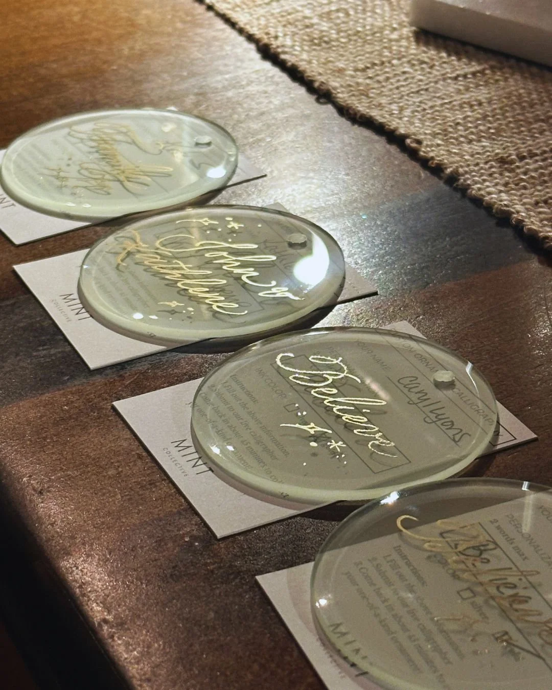 Glass ornament engraving calligraphy at Santa Monica by Choi Calligraphy, a live event artist