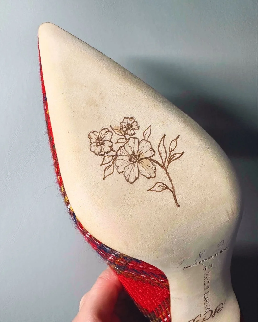 Luxury shoe bottoms personalized with floral illustration for South Coast Plaza Manolo Blahnik store opening