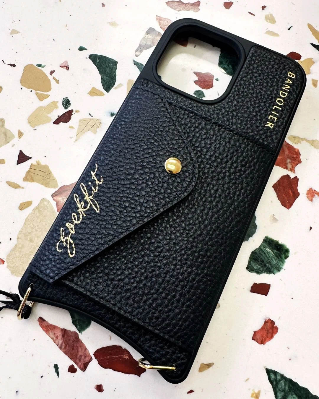 Bandolier phone case hot foiling personalization by Los Angeles calligraphy artist Hannah Choi