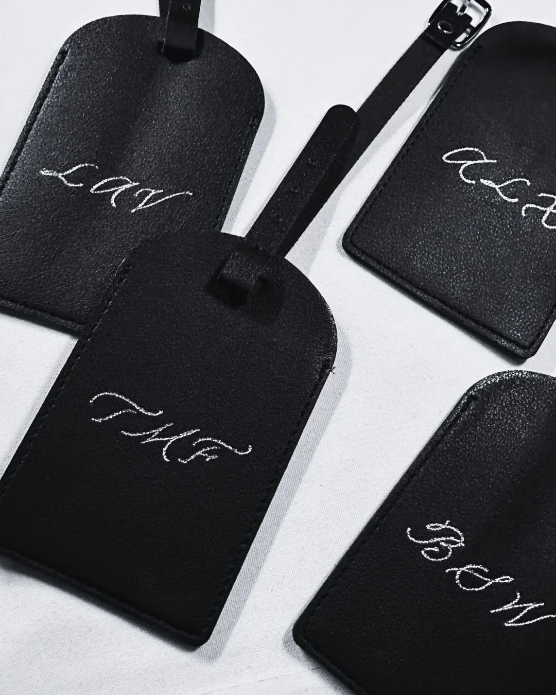 Luggage tag hot foiling monograms for Los Angeles corporate event