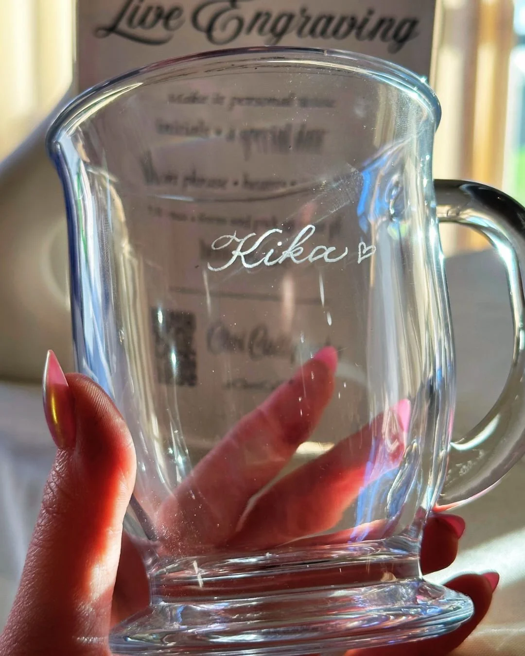 Los Angeles calligraphy artist engraving on glass mugs for Galentine's event in Santa Monica