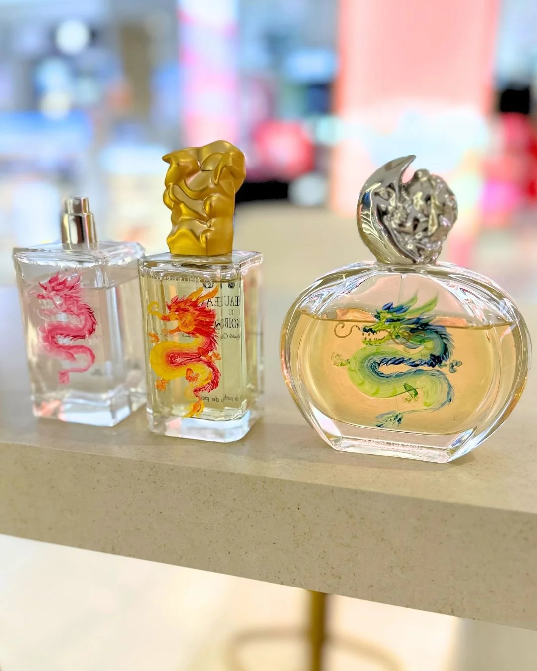 Sisley perfume live bottle painting at LAX duty free shop for Lunar New Year of the Dragon