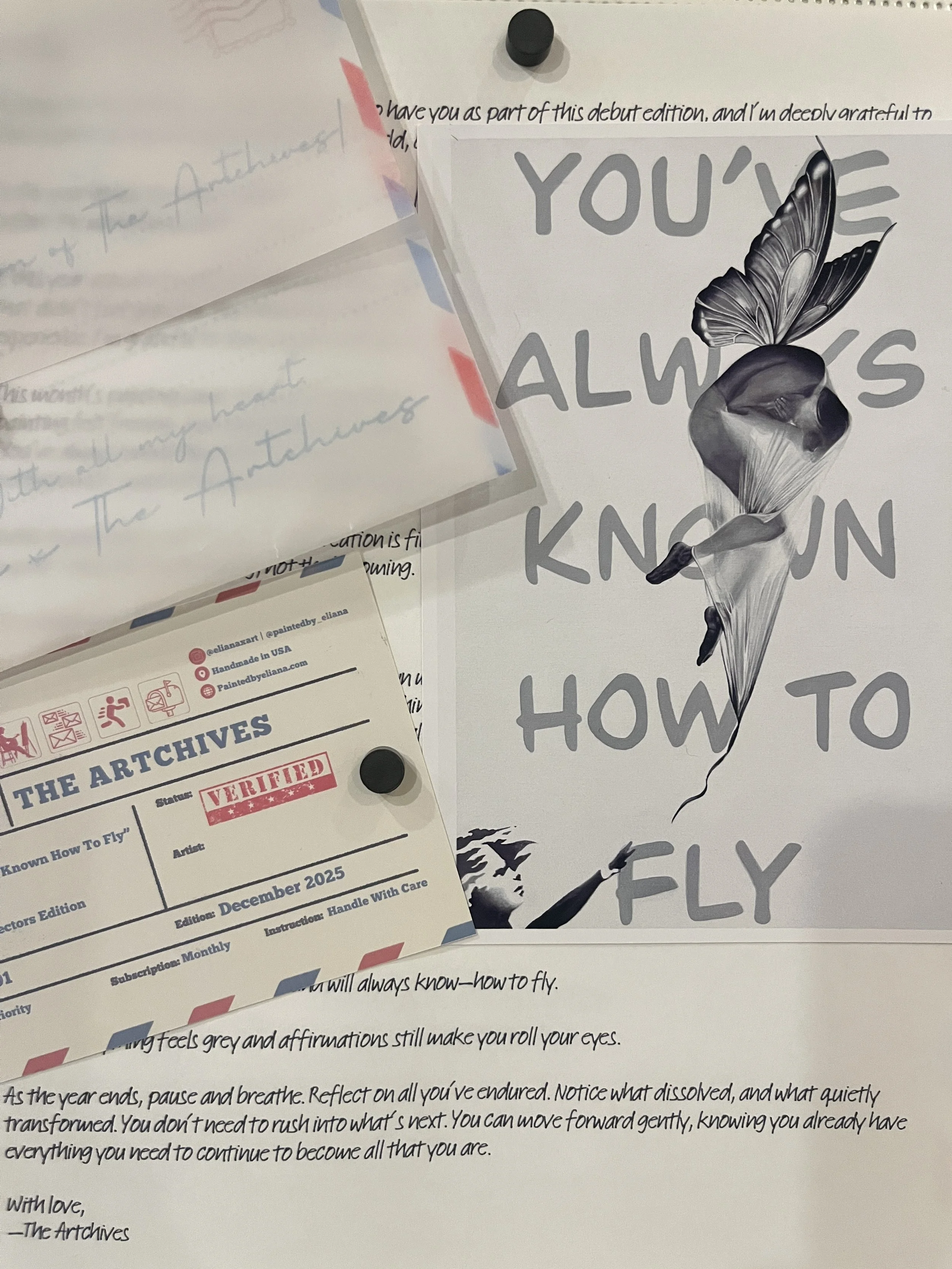 A collection of papers and notes, including a book titled 'You’ve Always Known How to Fly', a verification card from 'The Archives' with the title 'Known How To Fly', and handwritten notes about learning to fly and reflections on the end of the year.