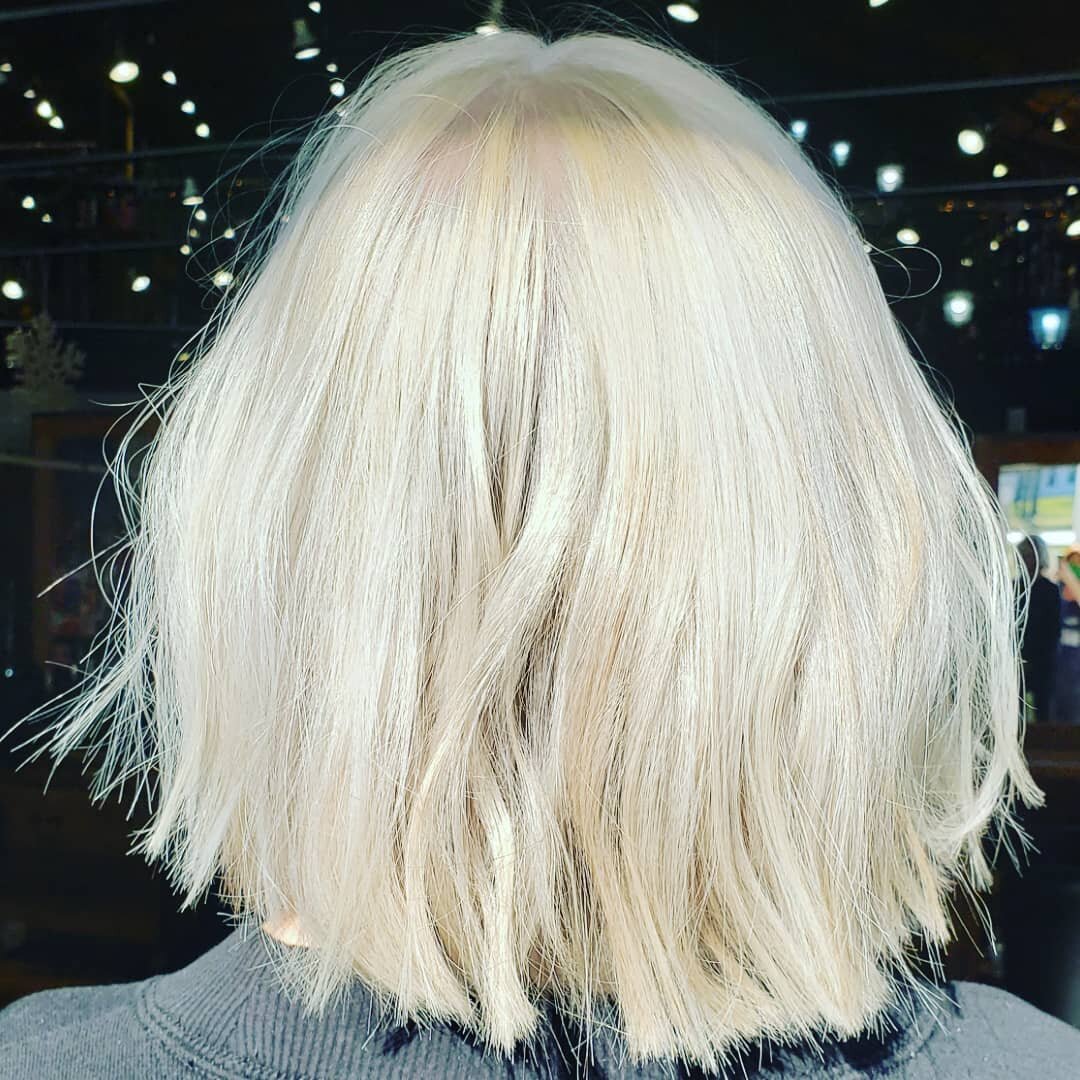 All over Lightner with foils and toned. White as snow!
