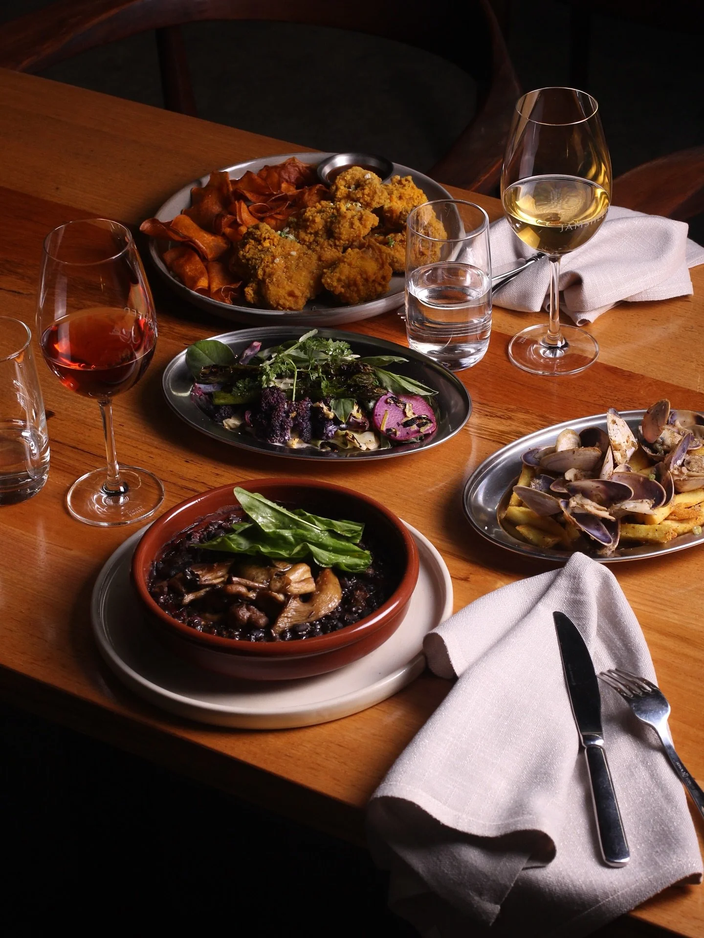 A little spread featuring CFC: Caribbean fried chicken, wood fired mushroom and black bean cazuela, the one and only pippies and chippies and some seasonal veg (cooked with fire, of course). Come get some this weekend!