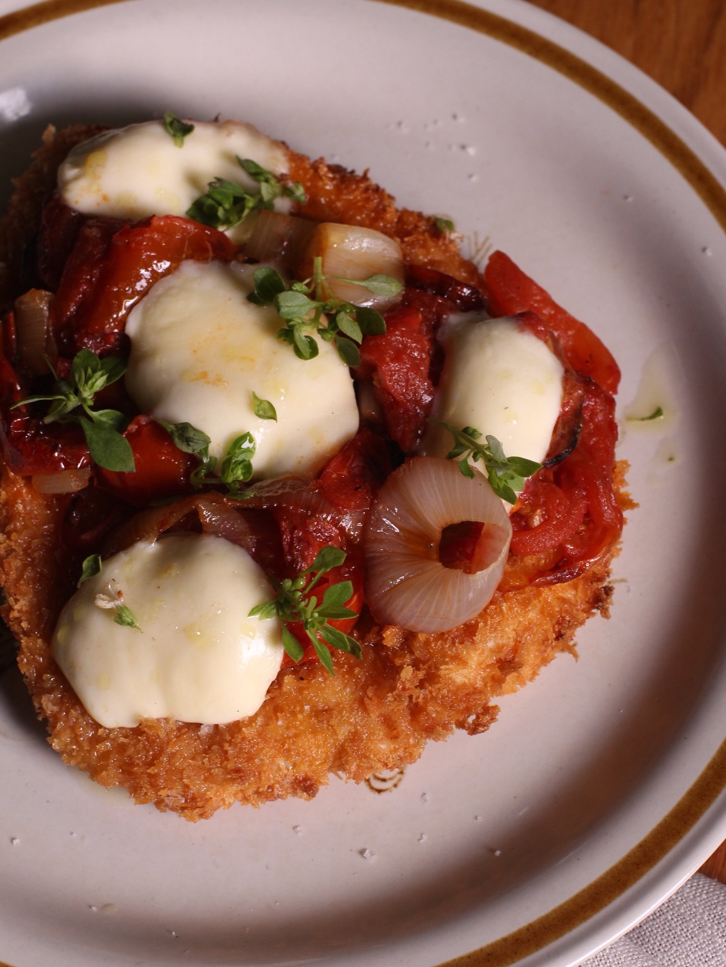 Chicken schnitzel with smoked tomatoes, fior di latte and Greek basil. Yes. It&rsquo;s a fancy Parma. Yes. It&rsquo;s damn delicious. Do yourself a favour.