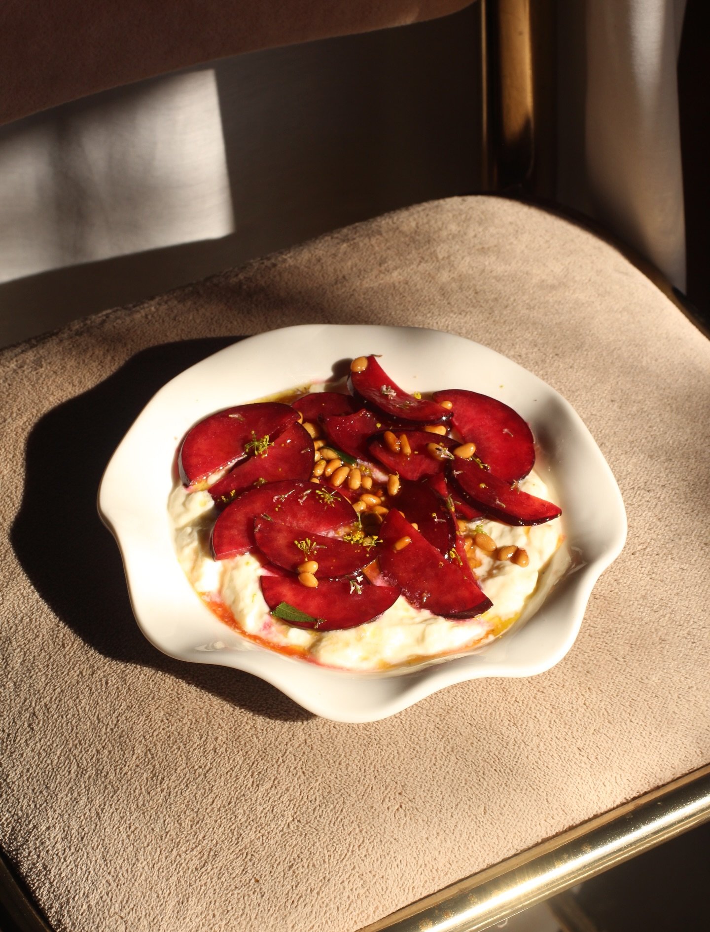 Stracciatella with plums, orange thyme and pine nuts. Add some house made flatbread and you&rsquo;ll be laughing! Here till late tonight ✨