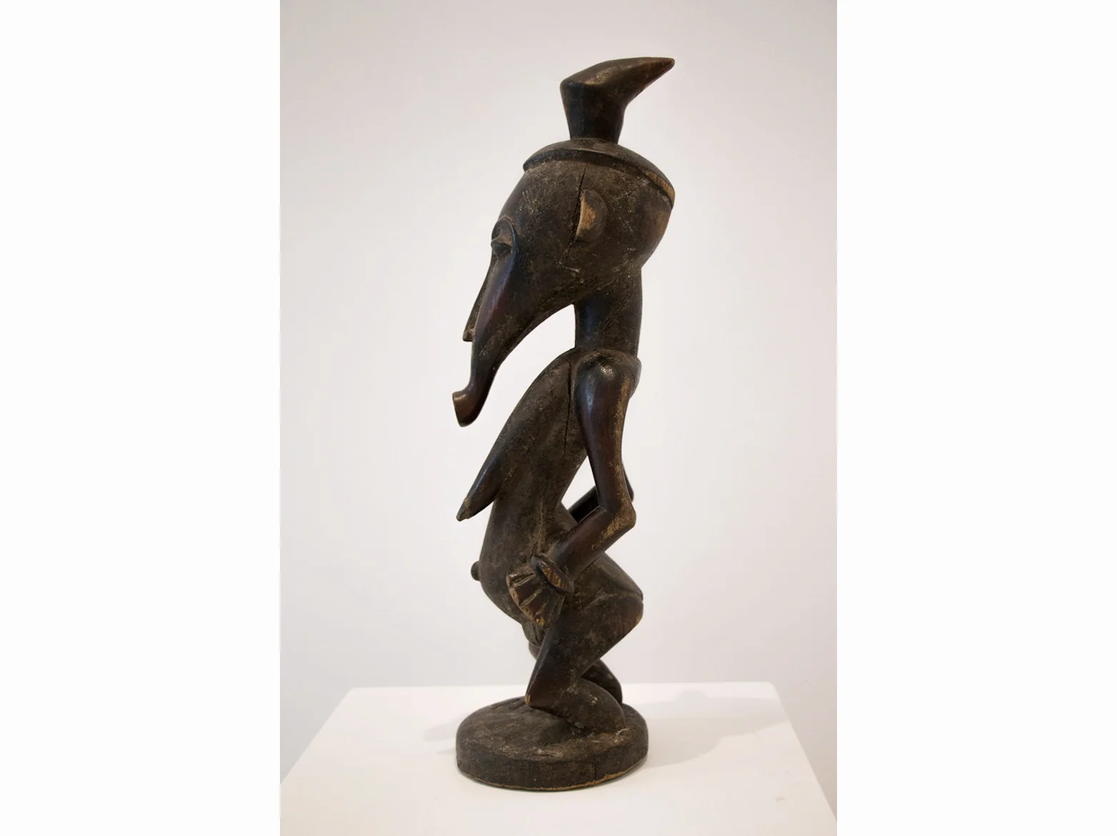 Côte d'Ivoire Figure of woman Senufo | late XIX century | wood carving | 55 x 58 x 18 cm.