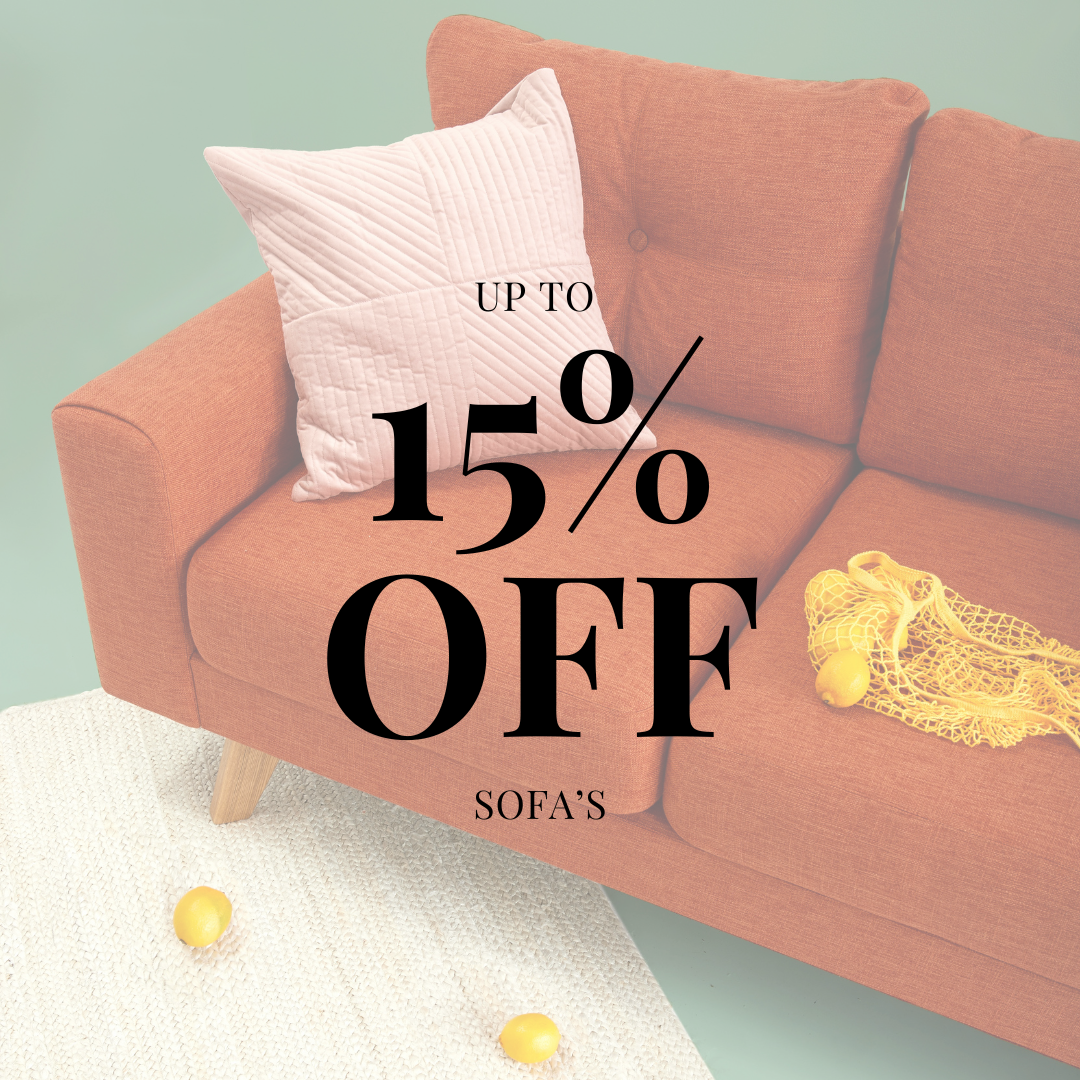 Living room sofa with a light pink pillow and yellow net bags with lemons on the right armrest, with text over the image advertising up to 15% off on sofas.