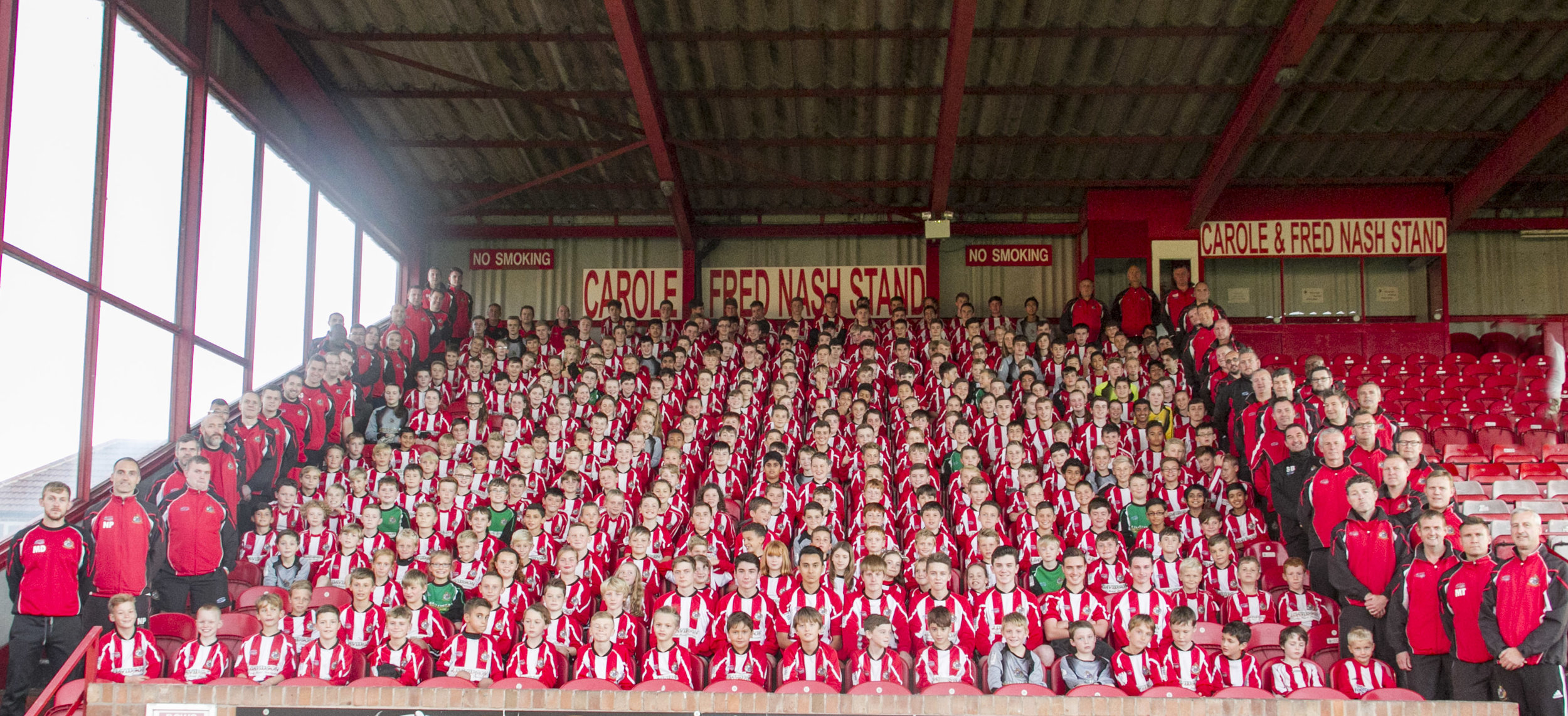 Altrincham FC Juniors gathered in the stand