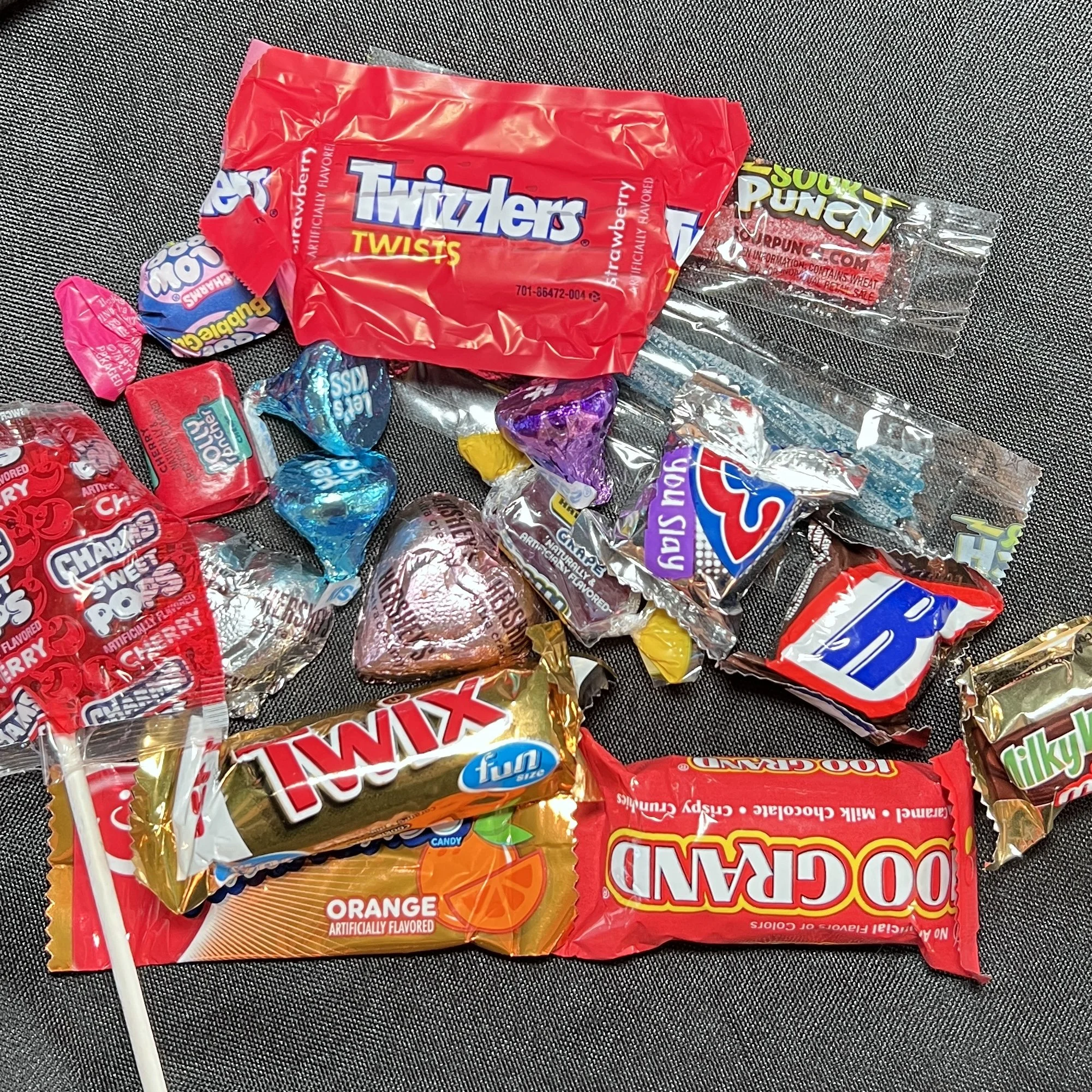 What is inside of the treat cups? We use a variety of pre-wrapped name brand candy. We mix sweet candies and chocolate to have a great mix.