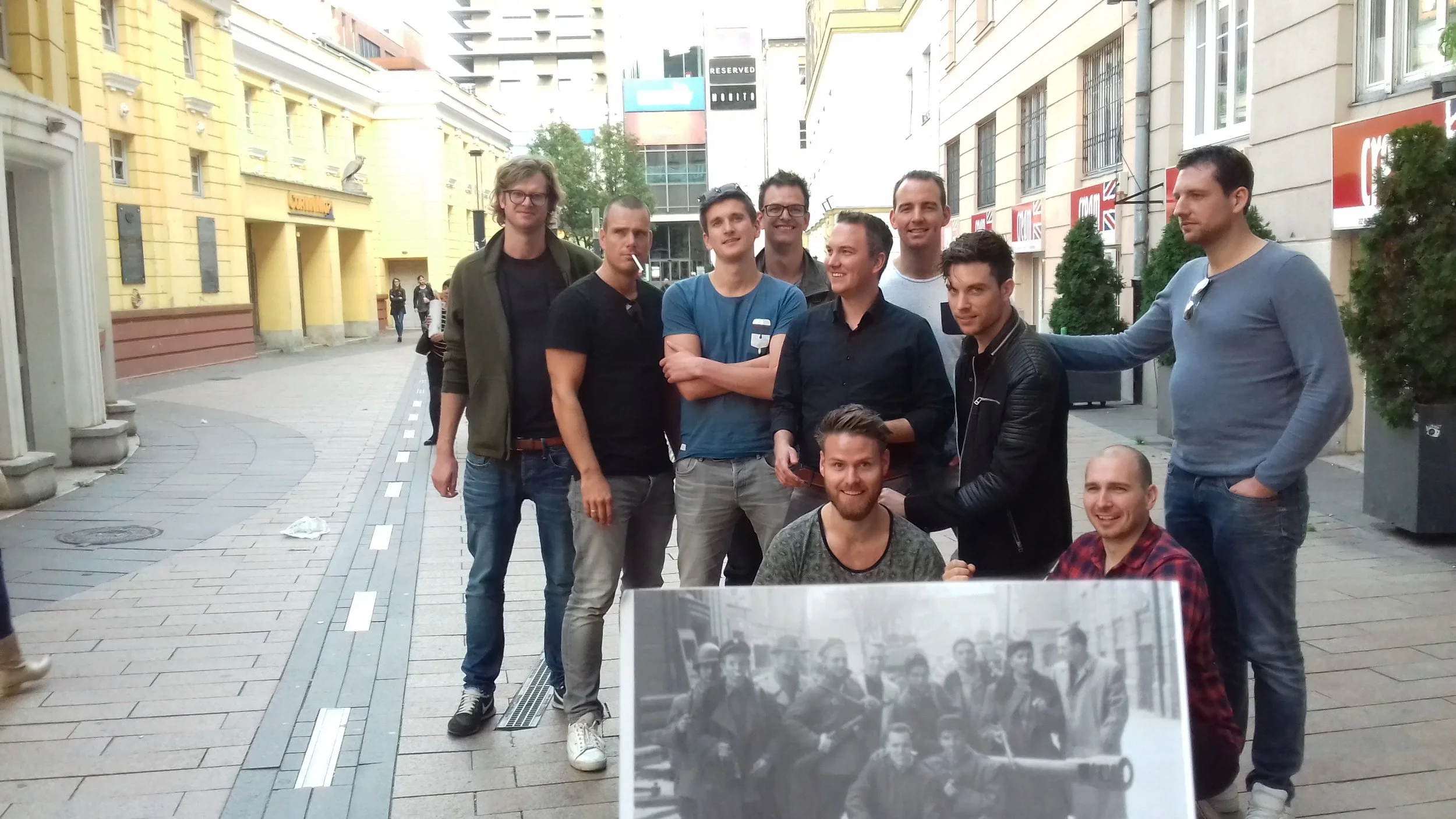 A bunch of amazing Dutch guys re-enacting a group photo of Hungarian freedom fighters of the 1956 revolution during a custom-tailored Cold War tour