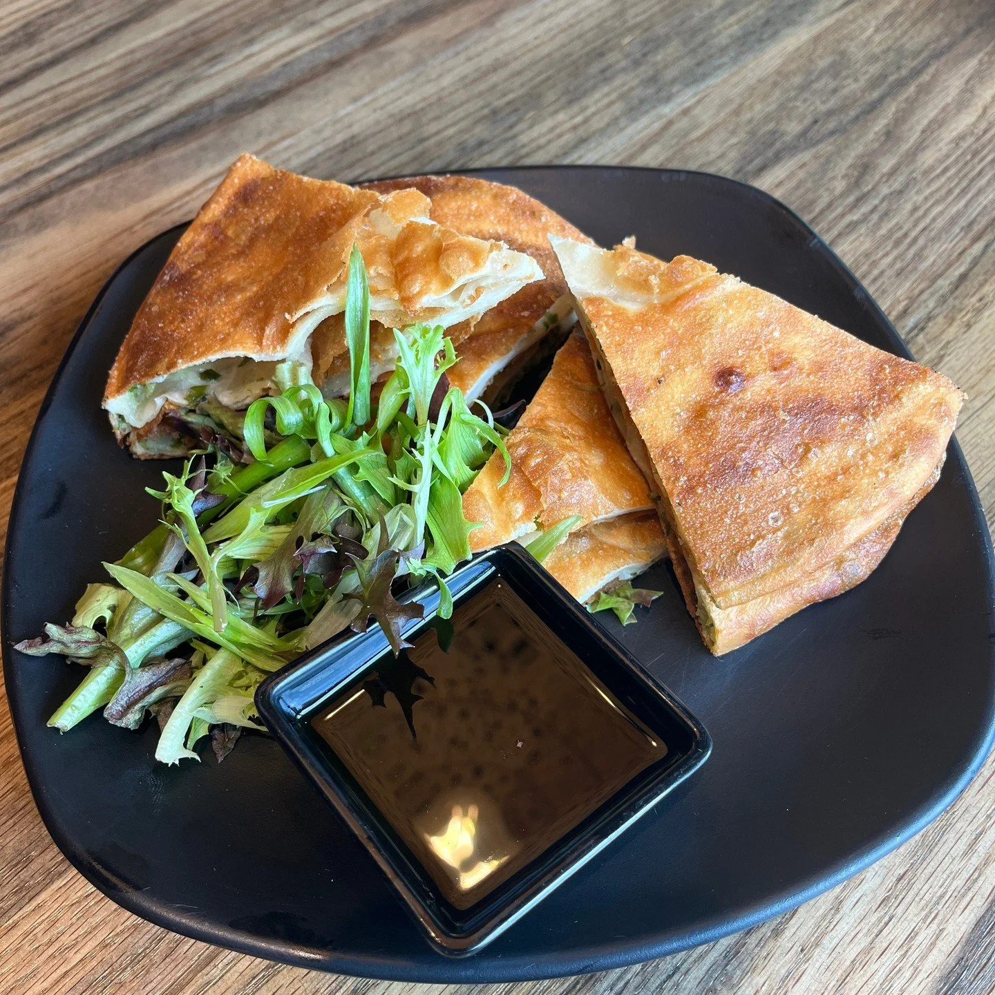Simply the best 🥢
Crispy scallion pancakes served with sweet &amp; savory soy sauce... a must-have at IYA Sushi!