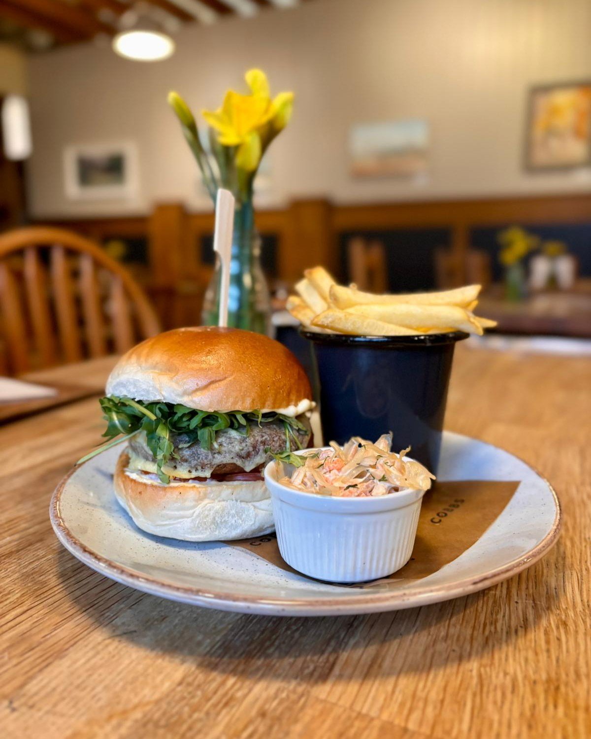 Menu item Monday⭐🍽️

Harissa Falafel Burger &ndash; Homemade spiced harissa falafel burger with melted Monterey Jack, jalape&ntilde;o mayo, ripe tomato &amp; rocket in a toasted Hobb&rsquo;s House bun. Served with skin-on fries &amp; Cobbs&rsquo; ho