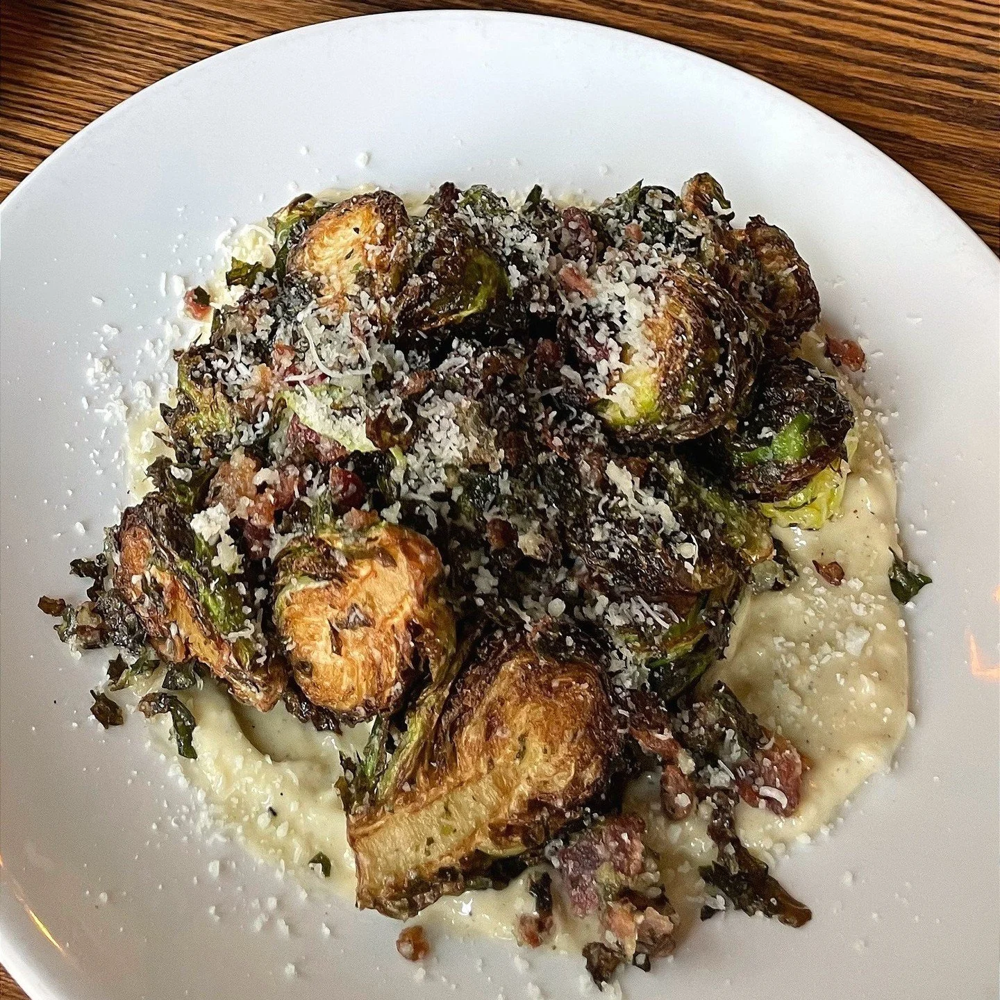 Brussels sprouts like you&rsquo;ve never had before 🥬 Garlic aioli, lemon, bacon, and pecorino... a must-try!!