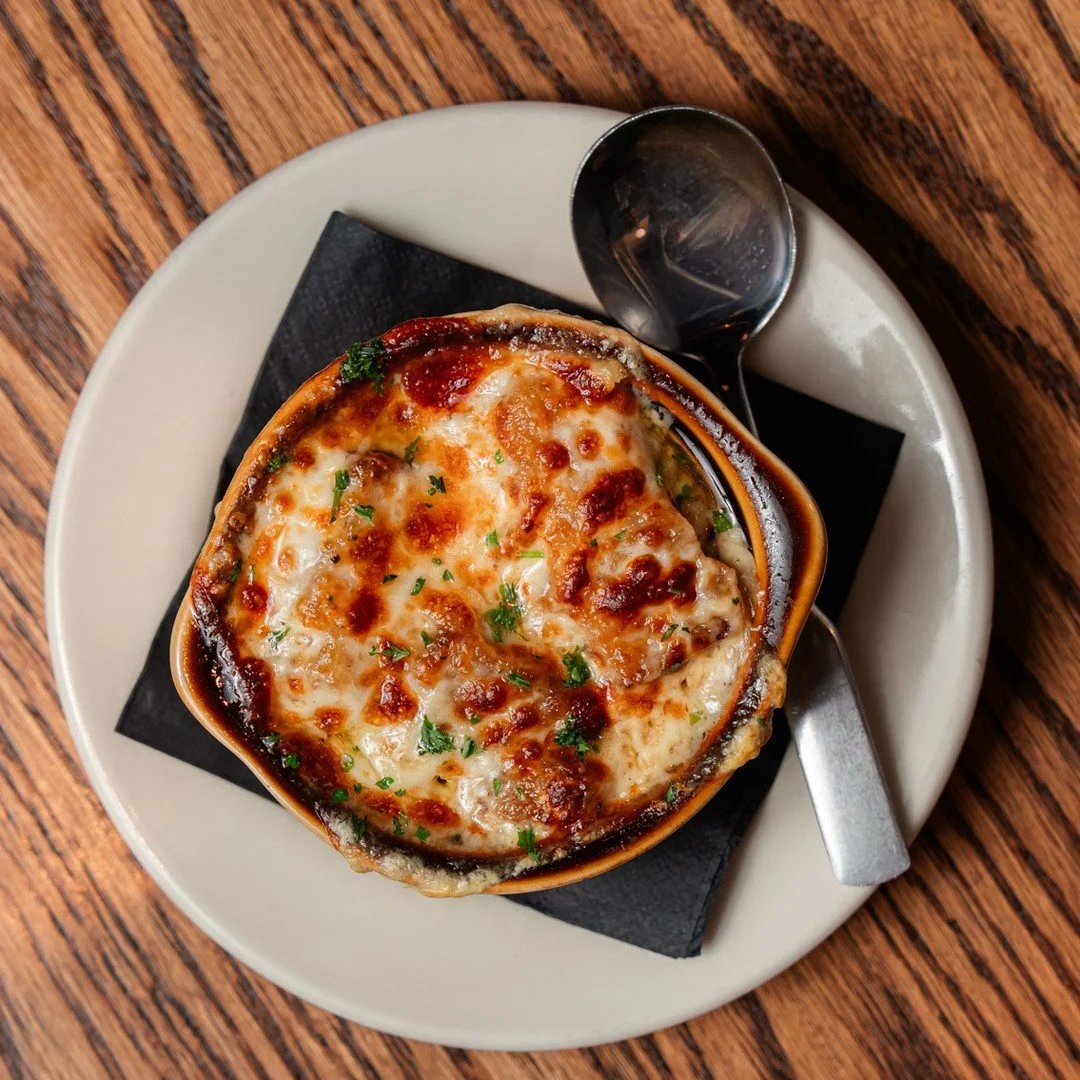 The ultimate warm-up: rich beef broth, caramelized onions, and melty cheese... Nothing hits like our French Onion Soup!❄️🍲