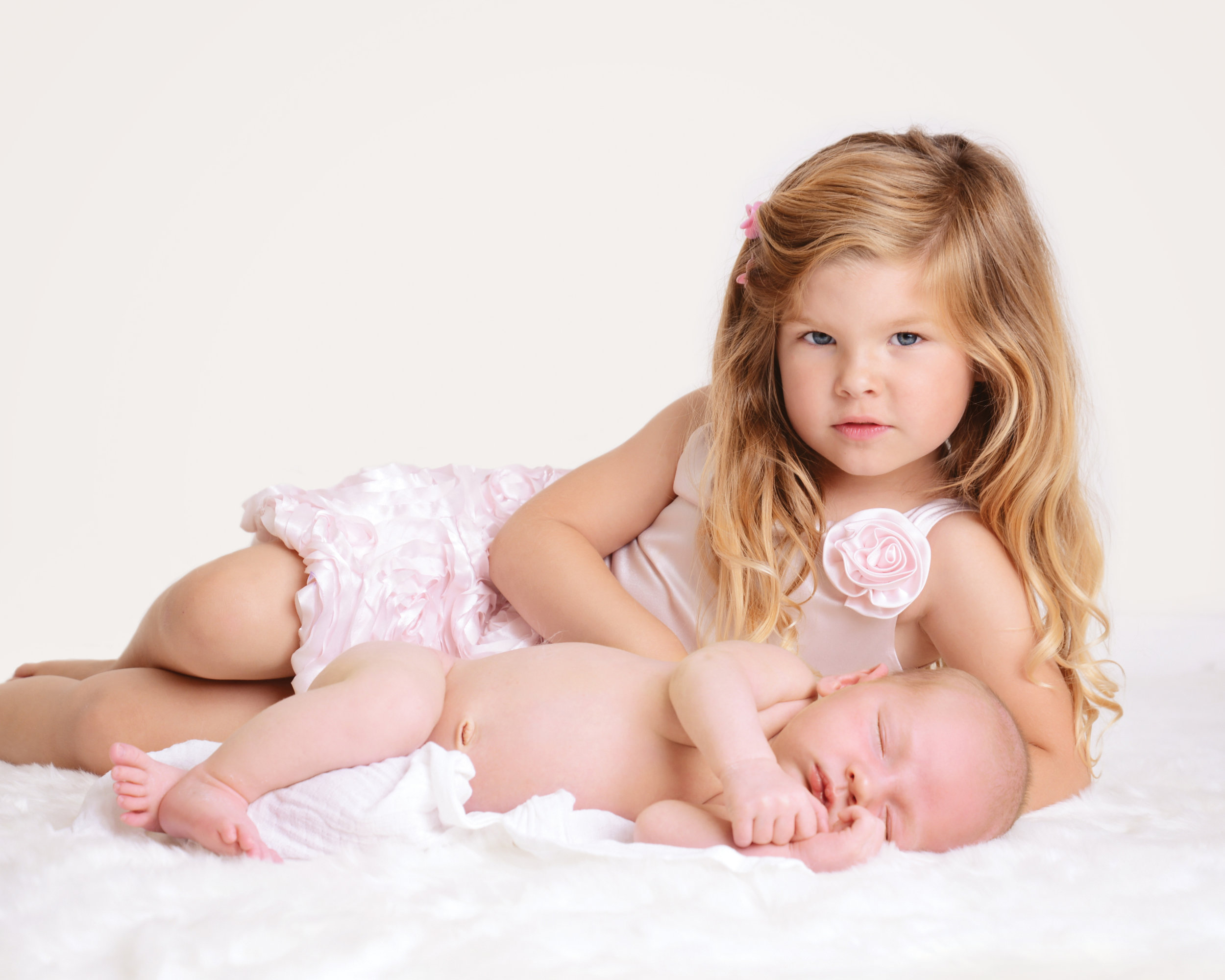 beautiful girl with newborn baby