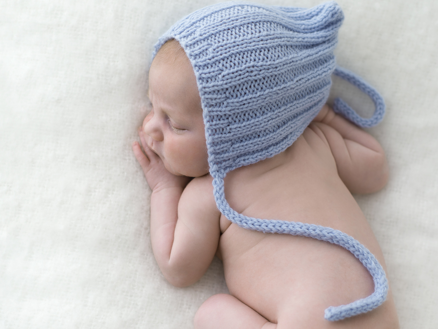 Newborn baby boy blue bonnet