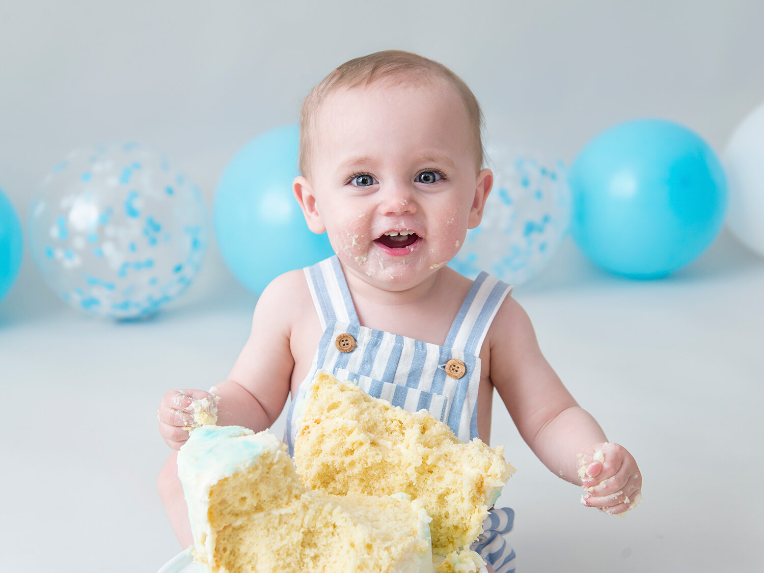 baby cake smash smiling dungarees