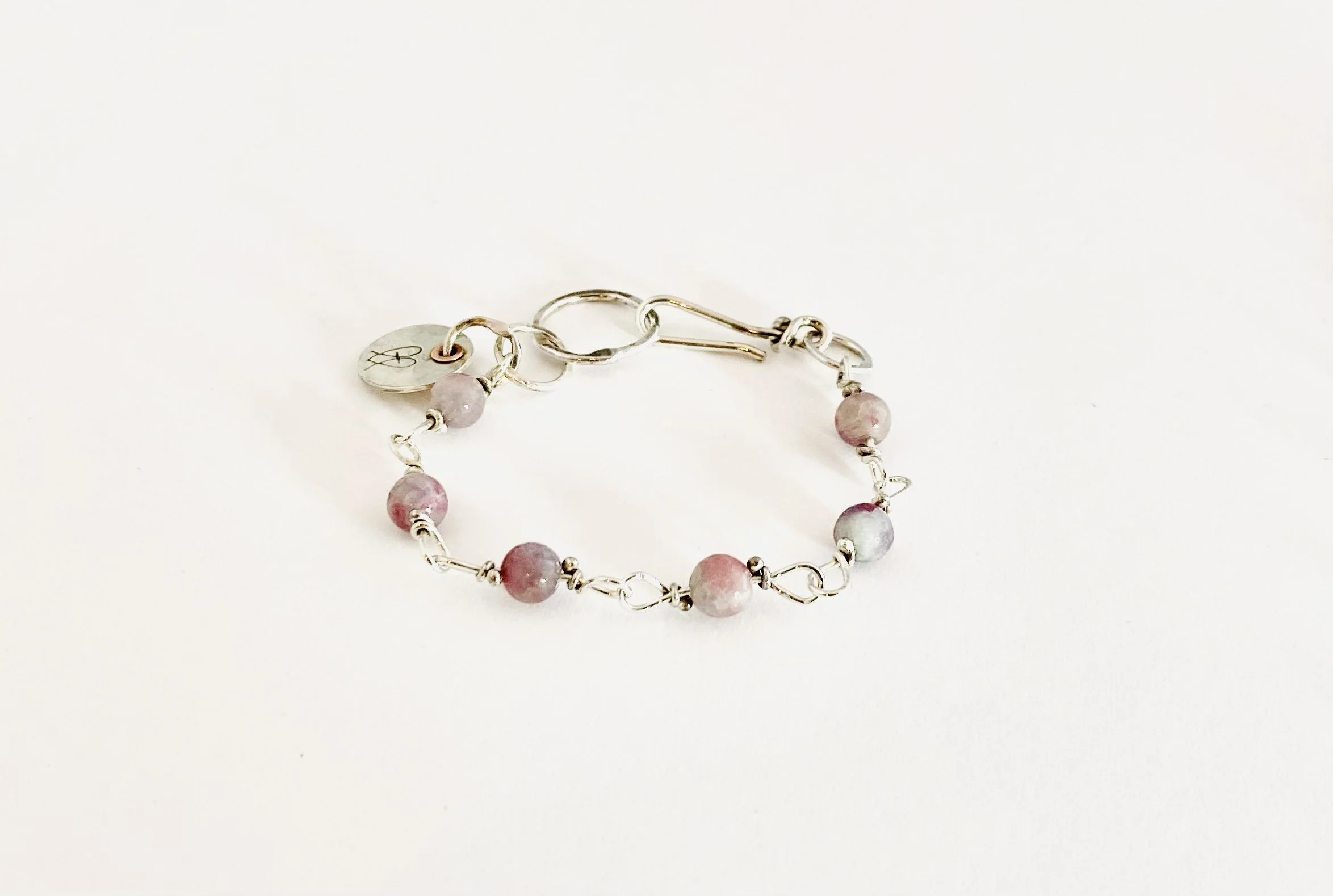 hhpinktourmalinecharmbracelet.jpeg