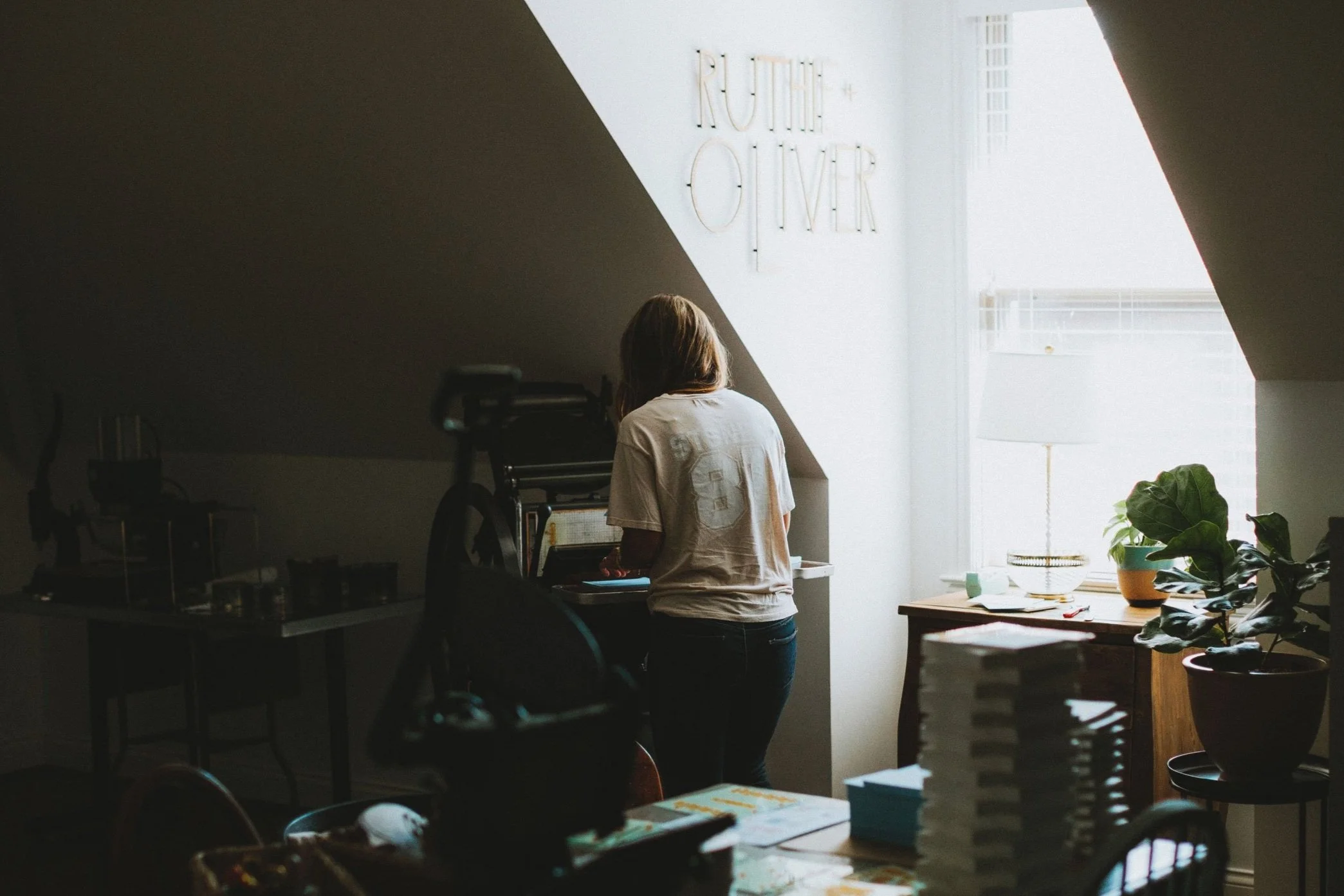 Erica working at the press.