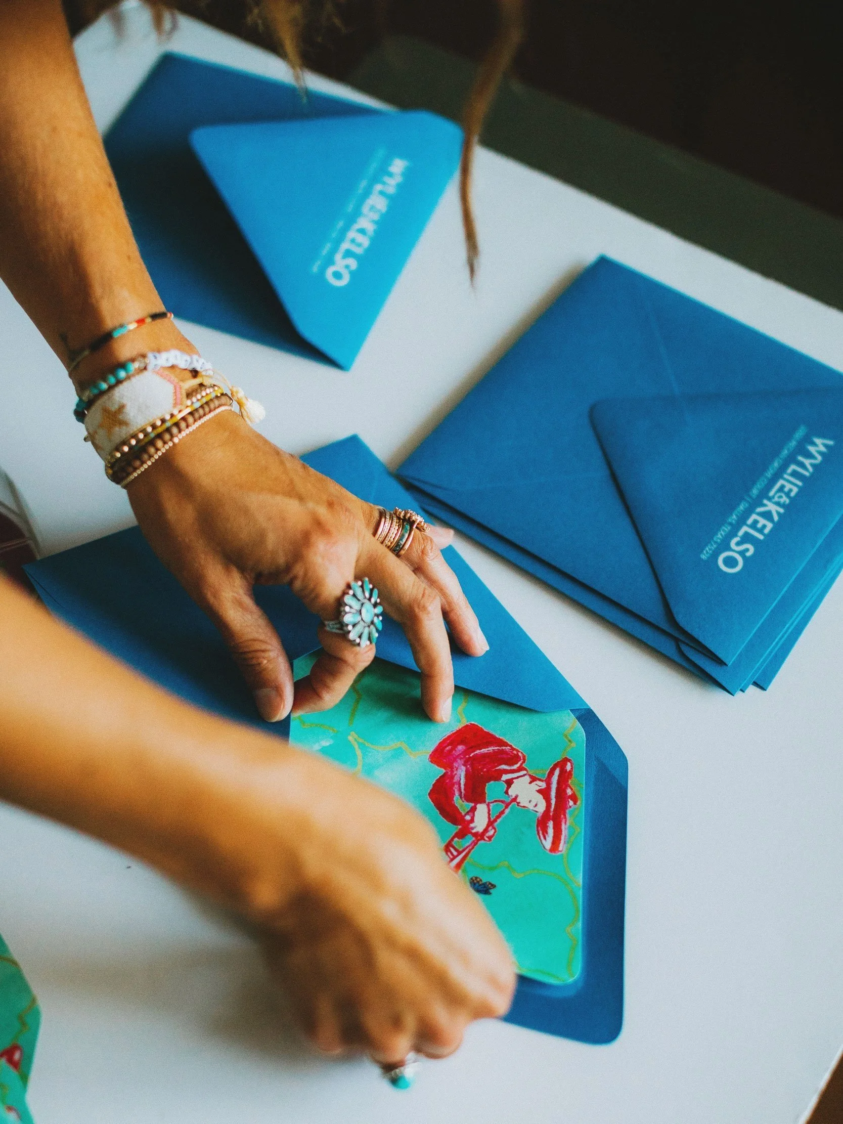 Applying Envelope Liners to Blue Envelopes