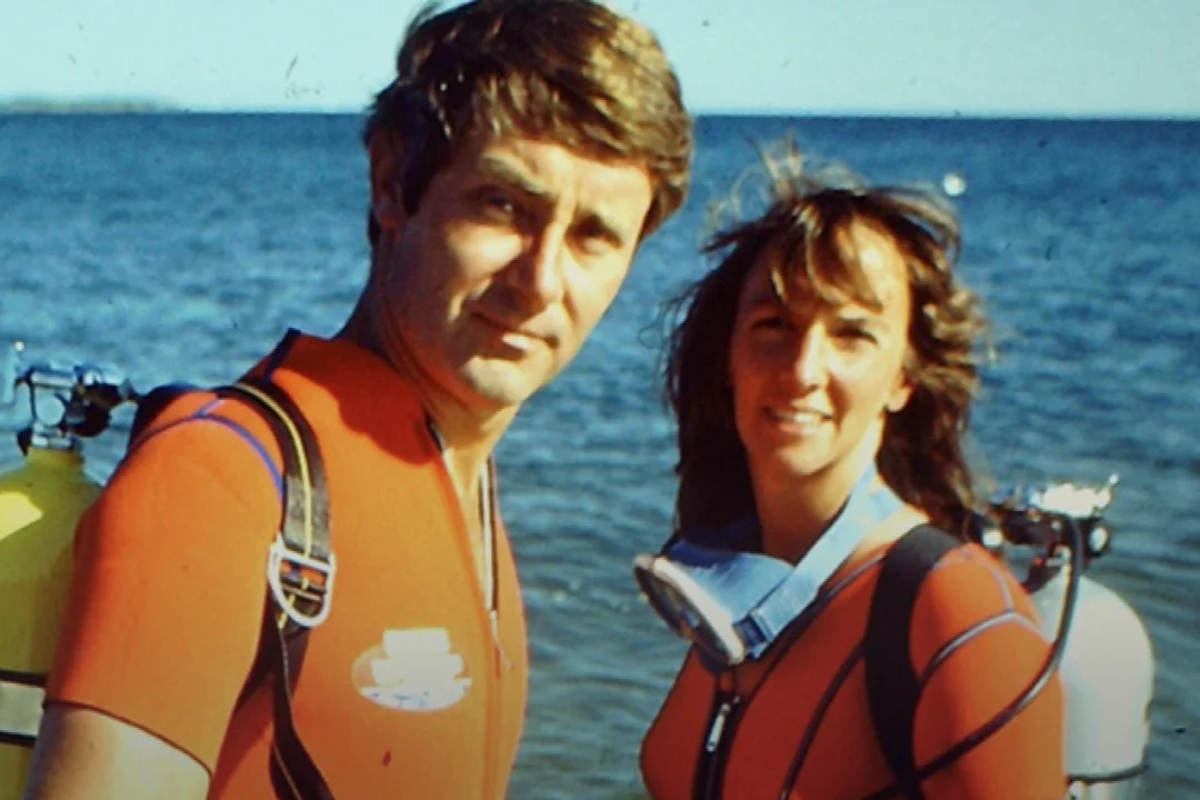 Red wetsuit WB and Peter.001.jpeg