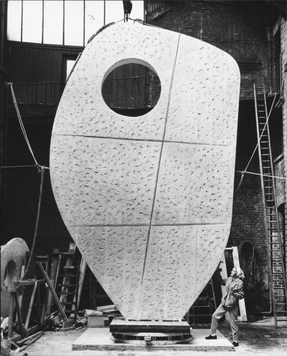 Dame Barbara Hepworth Alongside Her Monumental Creation at the Morris Singer Foundry
