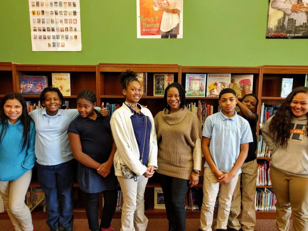 Ms. Tifani Kendrick and the aspiring poets of Harambee