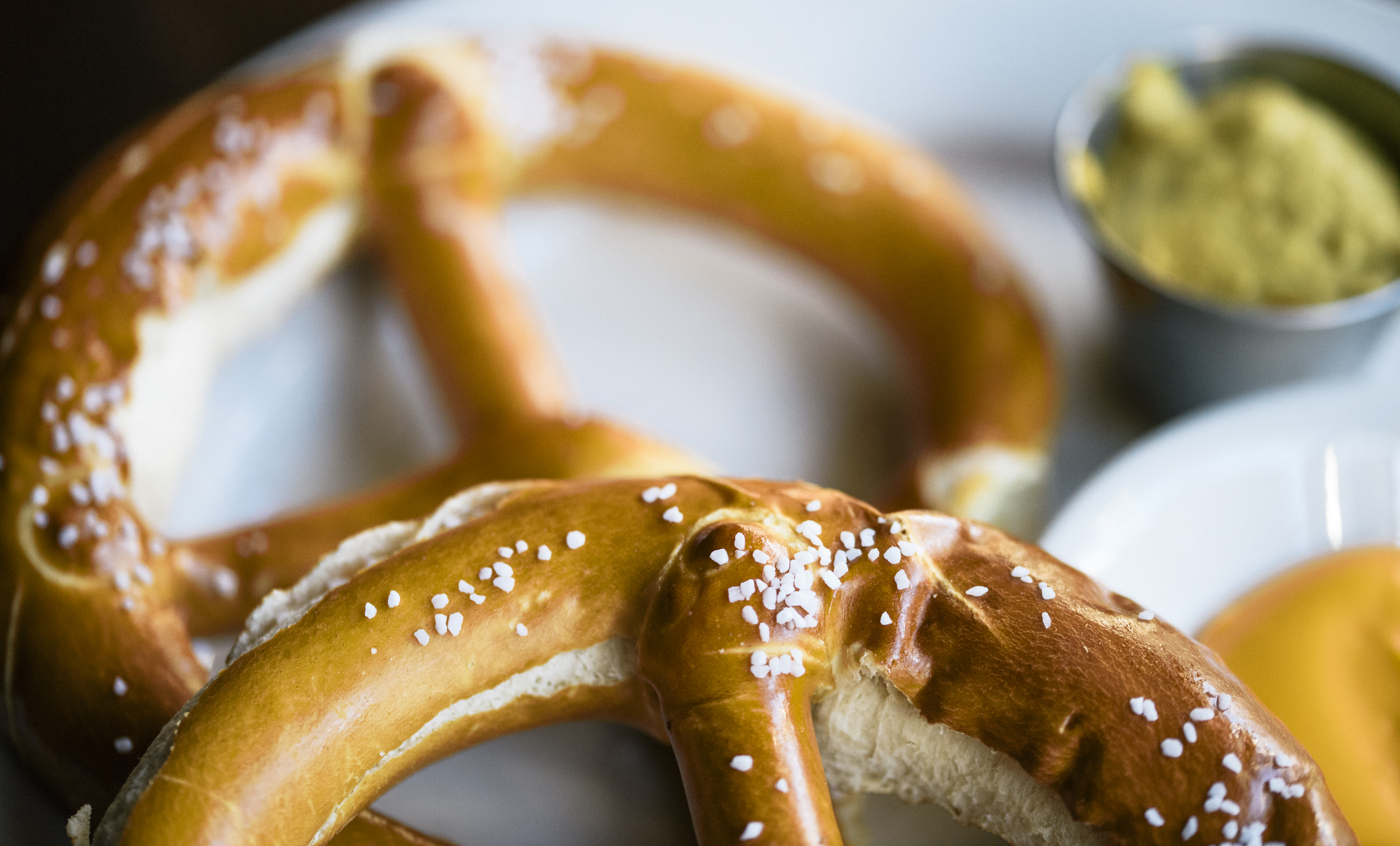Close up of two big soft pretzels