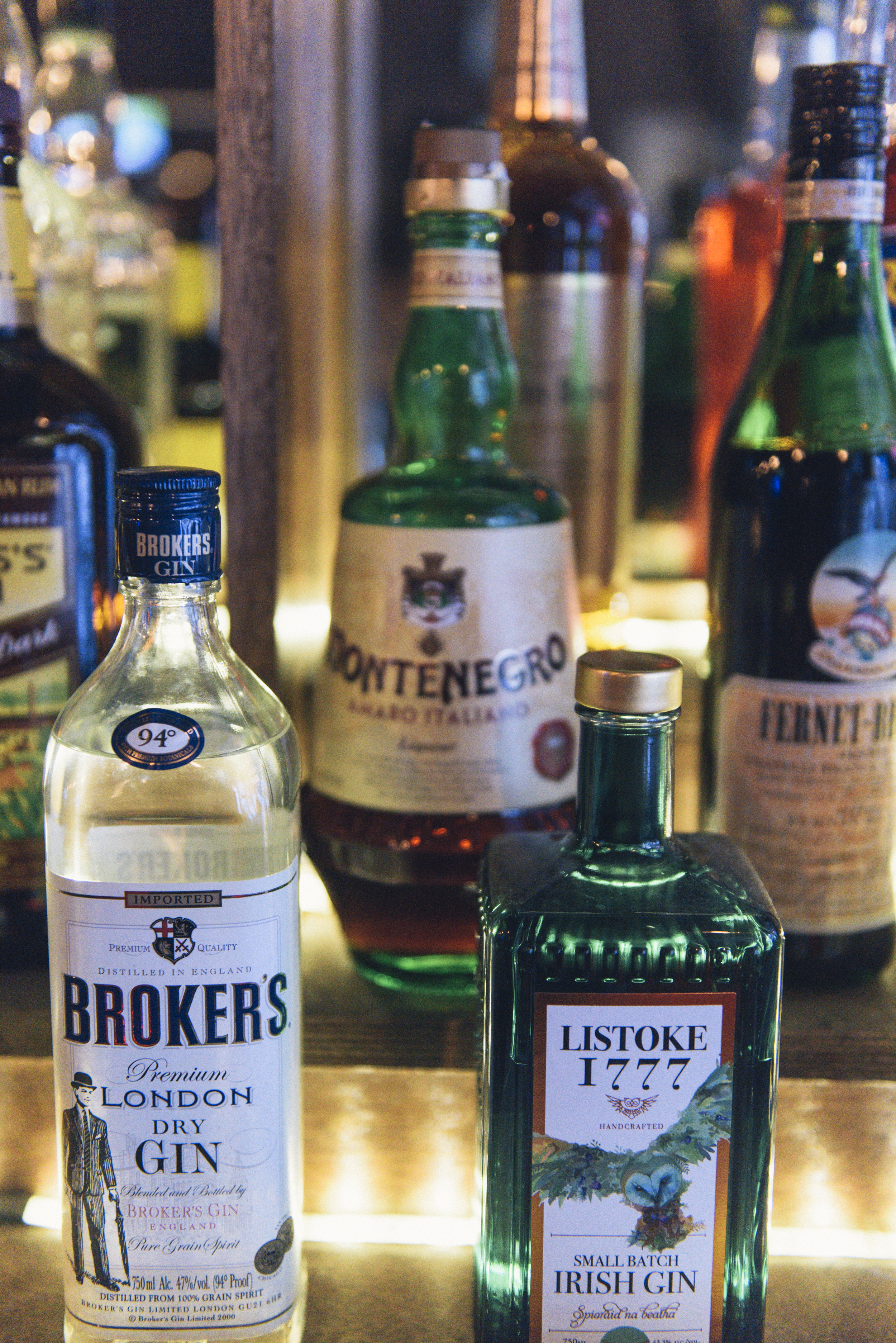 view of bar shelf with irish gin and italian liquor