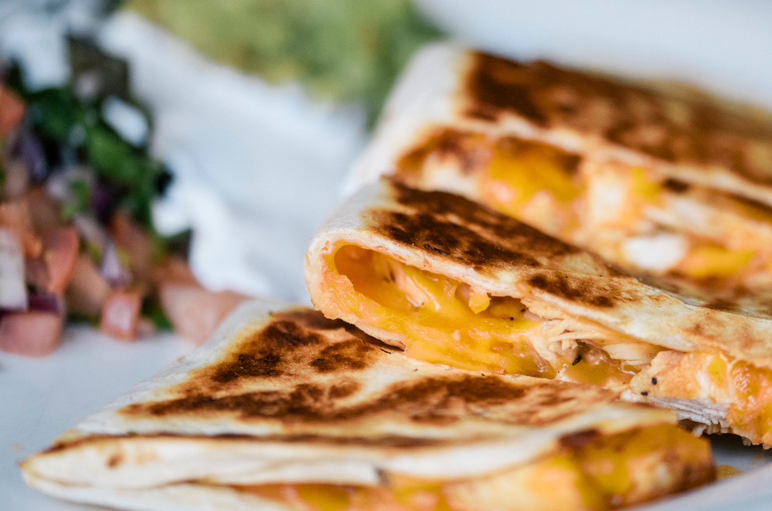 close up of chicken and cheese quesadilla