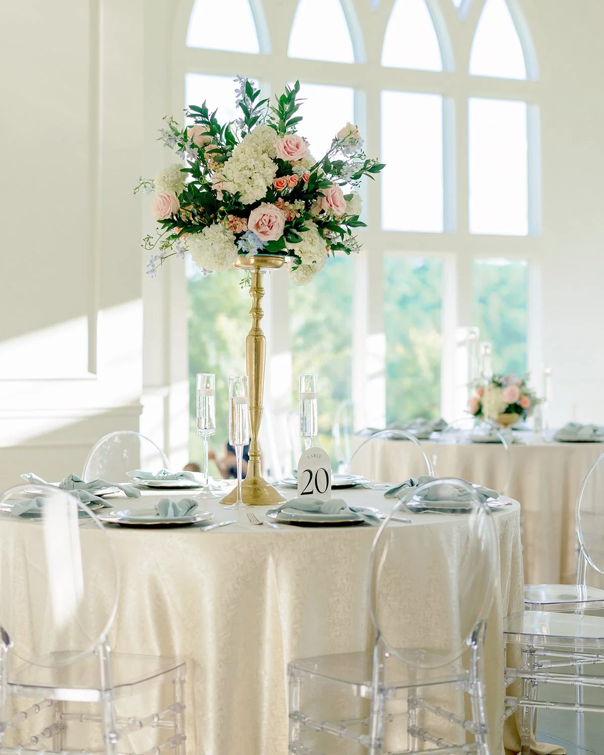 Tall floral centerpiece designed by Belli Fiori in St. Louis.