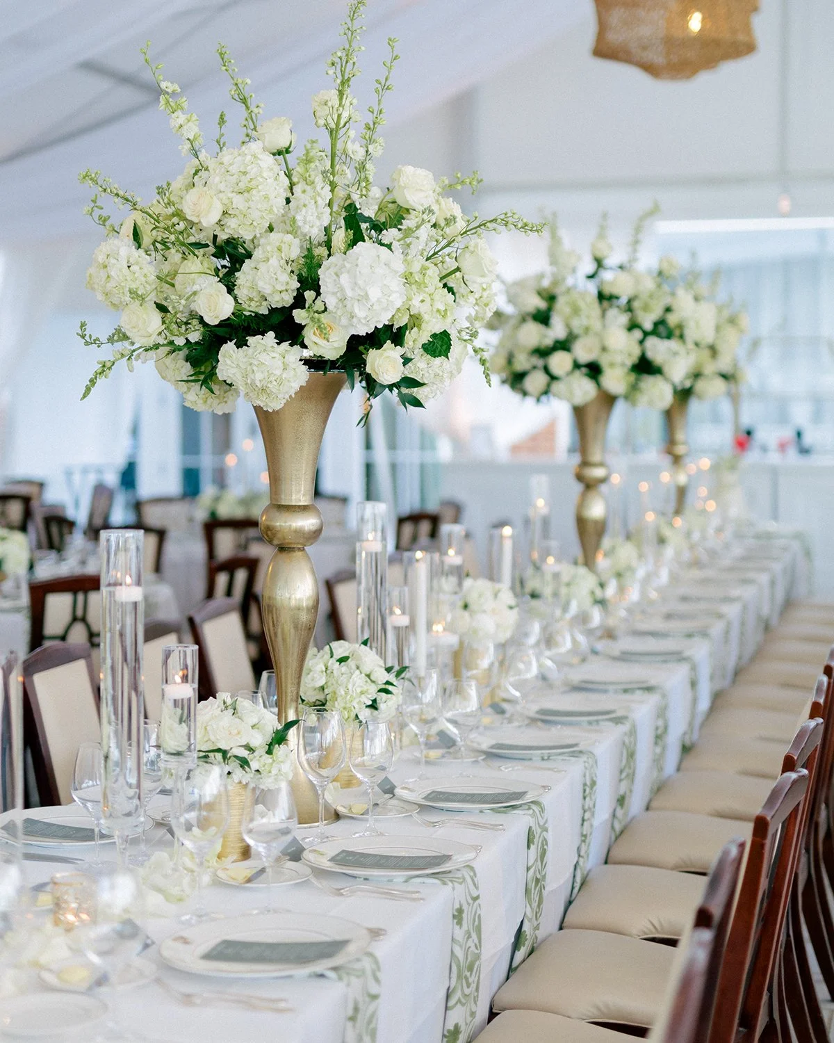 Green and white garden tent wedding at Old Warsaw country Club with wedding flowers designed by Belli Fiori.
