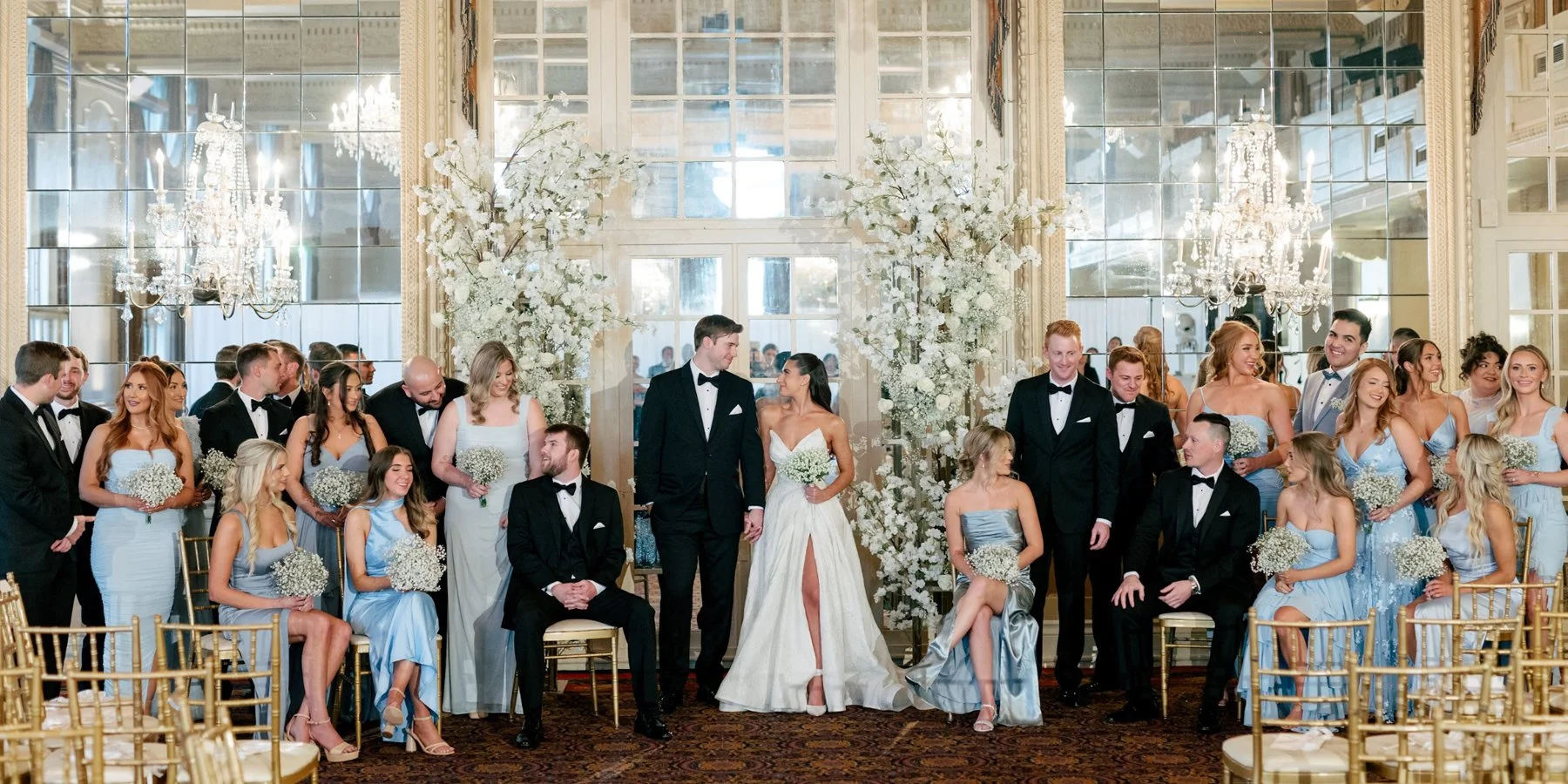Wedding party flowers designed by Belli Fiori at the Missouri Athletic Center in St. Louis.
