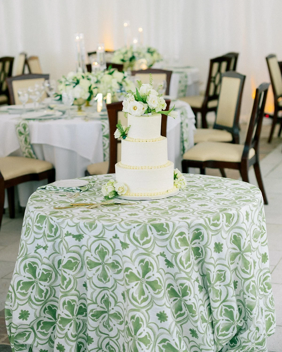 Green and white garden tent wedding at Old Warsaw country Club with wedding flowers designed by Belli Fiori.