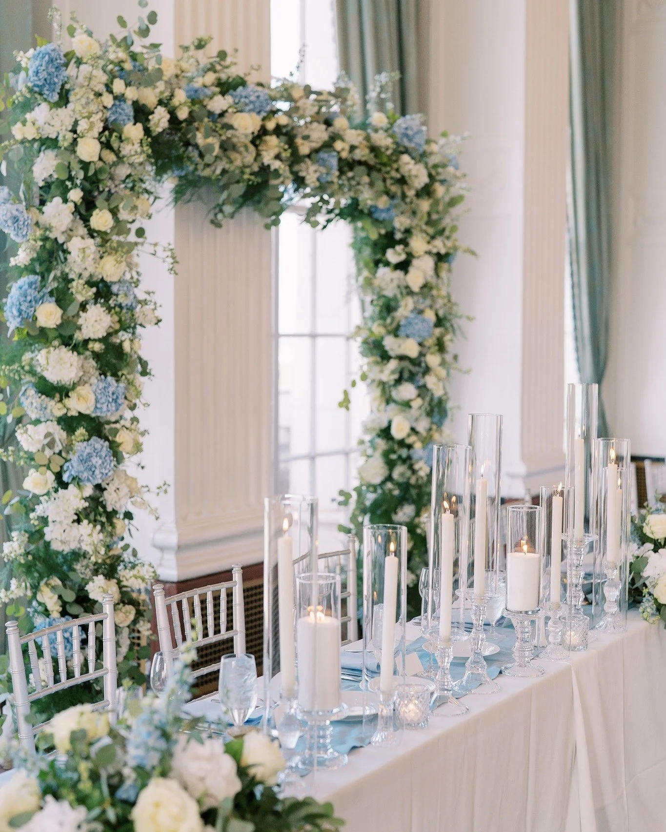 The magic of a beautiful head table and a room reveal to remember for a lifetime.🩵

There is nothing that the Belli Fiori Team loves more than creating stunning floral designs and seeing the 'Wow' moment on their faces when they get to experience th