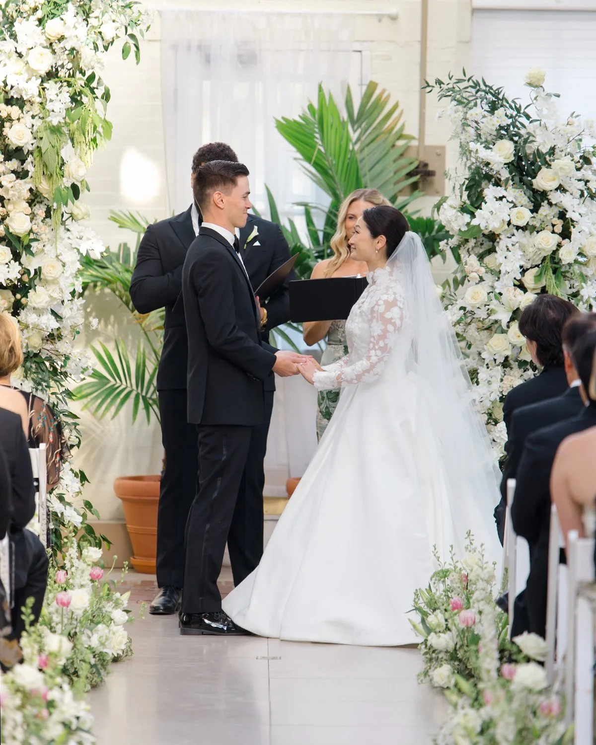 Some ceremony spaces are beautiful on their own. Add lush florals, the people you love most, and a little anticipation in the air...and they become unforgettable.

Nestled within the tropical beauty of the Piper Palm House, this ceremony felt like st