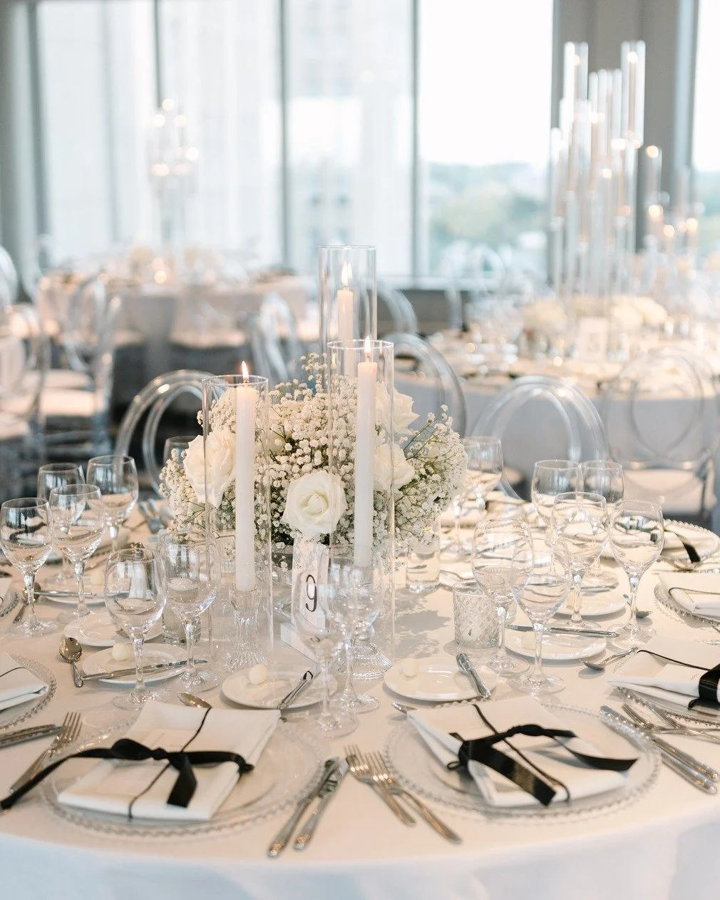You had us at panoramic St. Louis city views, candlelight, and bows...because who doesn't love bows!?

Don't let a monochromatic palette fool you into thinking that it's not to be appreciated. There are so many nuances to this design aesthetic, like 