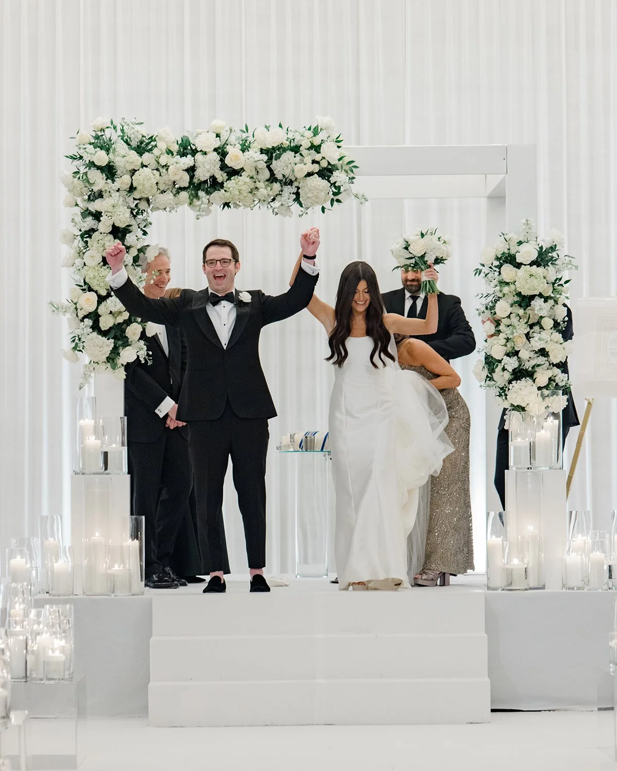 Mazel Tov! ✨🤍✨

A romantic, candlelit ceremony made even more meaningful beneath an all-white chuppah designed to feel timeless, elegant, and full of heart.

We love showing how a monochromatic moment can still feel layered and rich...through though
