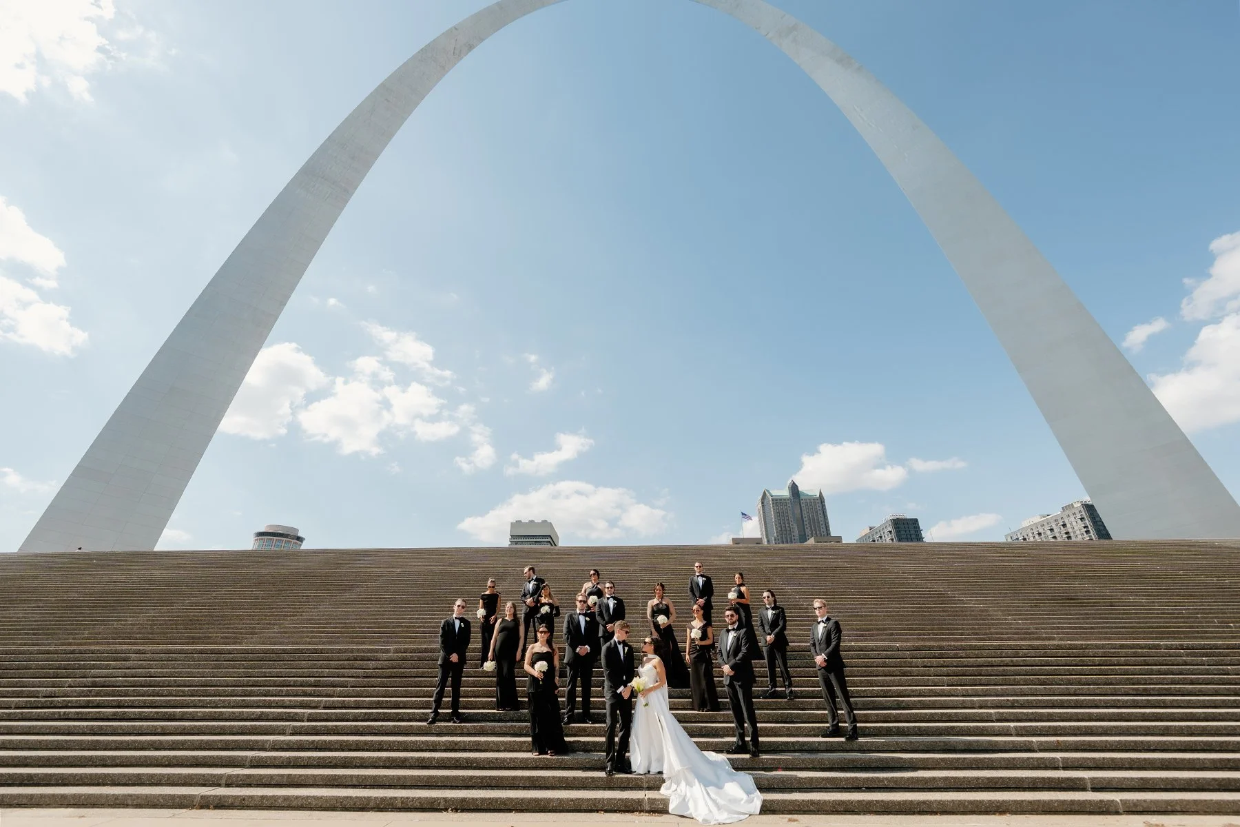 Classic never goes out of style. 🖤🤍

Black tuxedos, timeless white blooms, and the St. Louis Arch standing proudly in the background&mdash;a wedding party moment that feels unmistakably St. Louis and effortlessly elegant.

Some photographs are beau